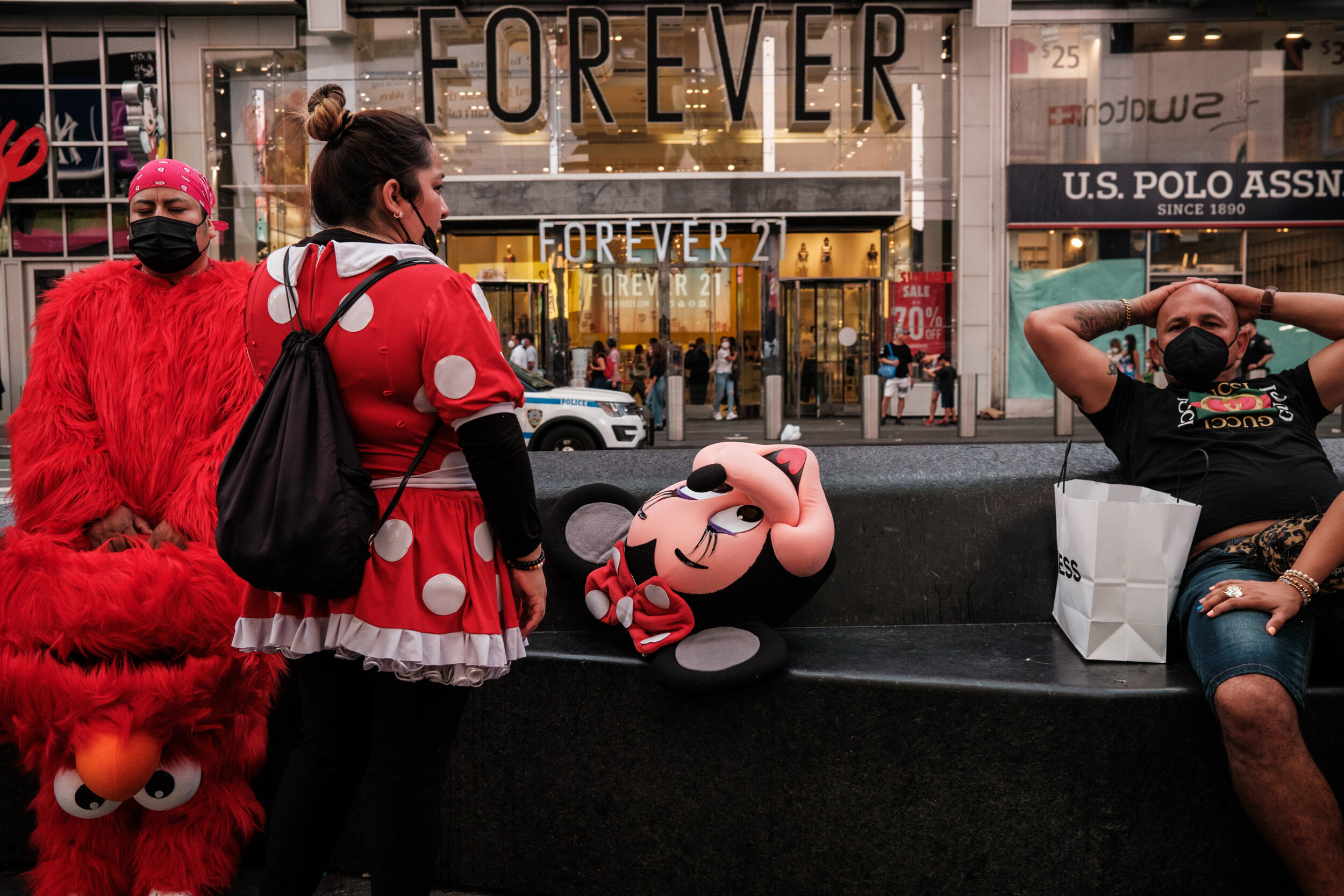  Costumed characters take a break in Times Square in NYC 