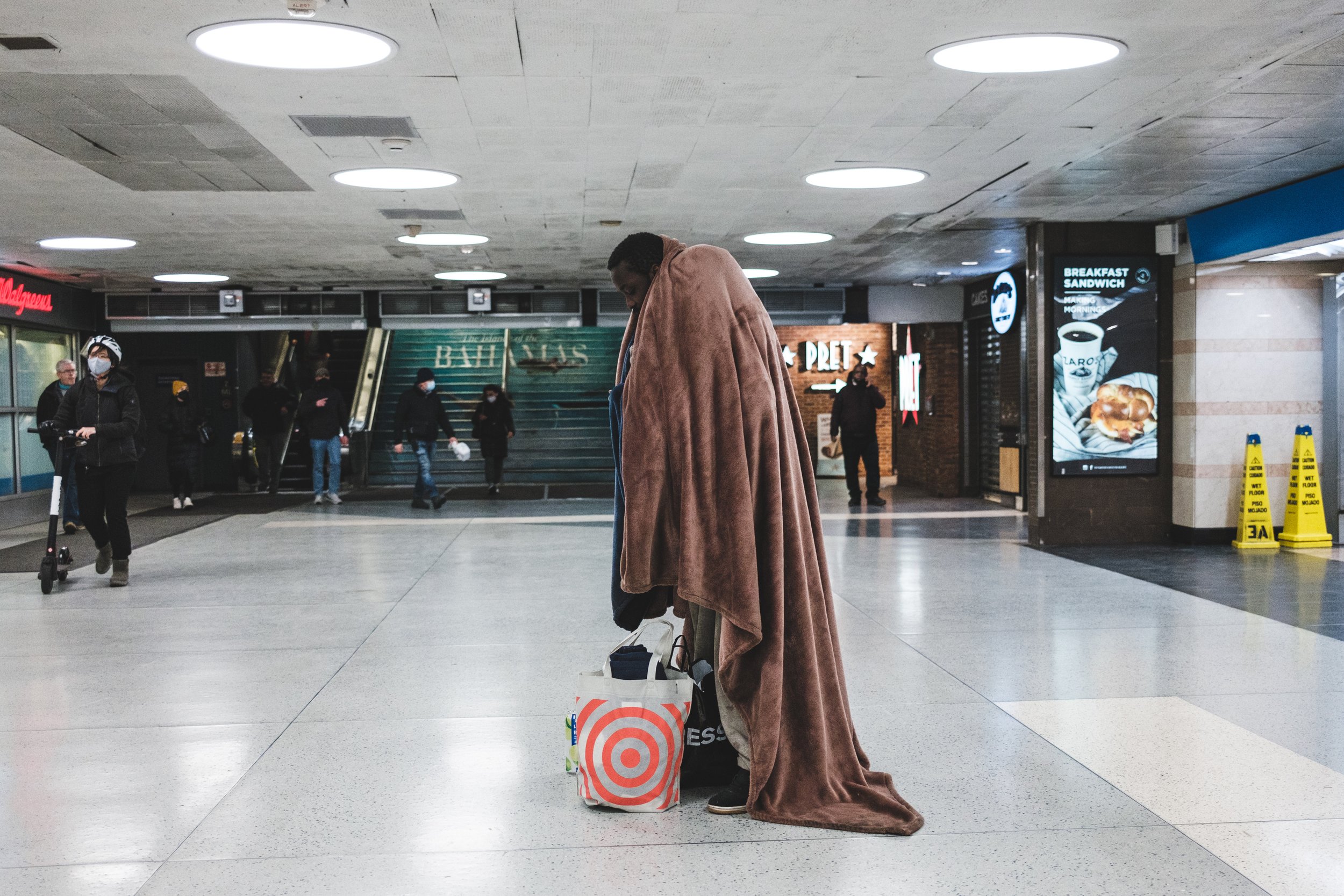  A homeless man walks through Penn Station in Manhattan 