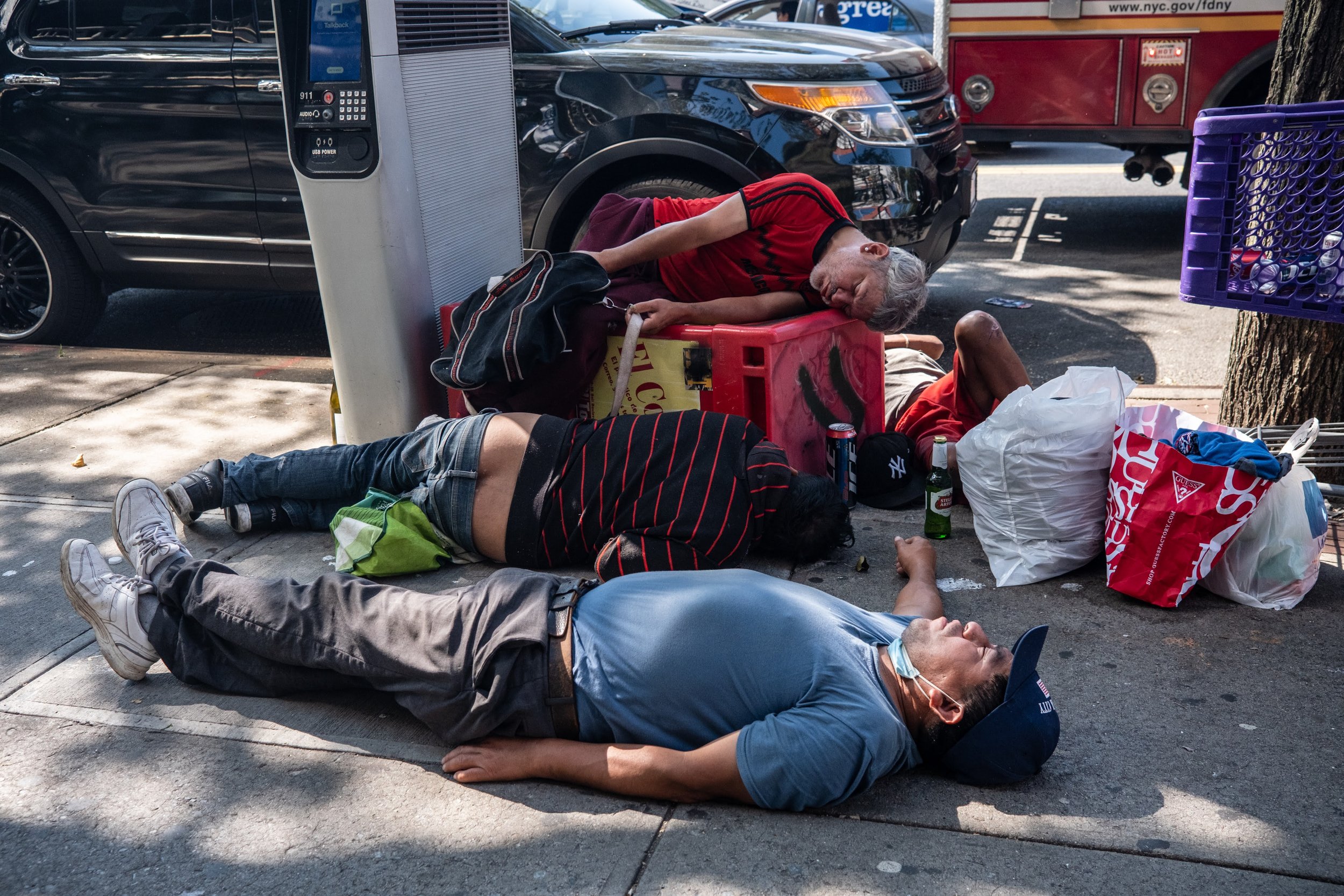  Men sleep on the street in Jackson Heights, Queens 