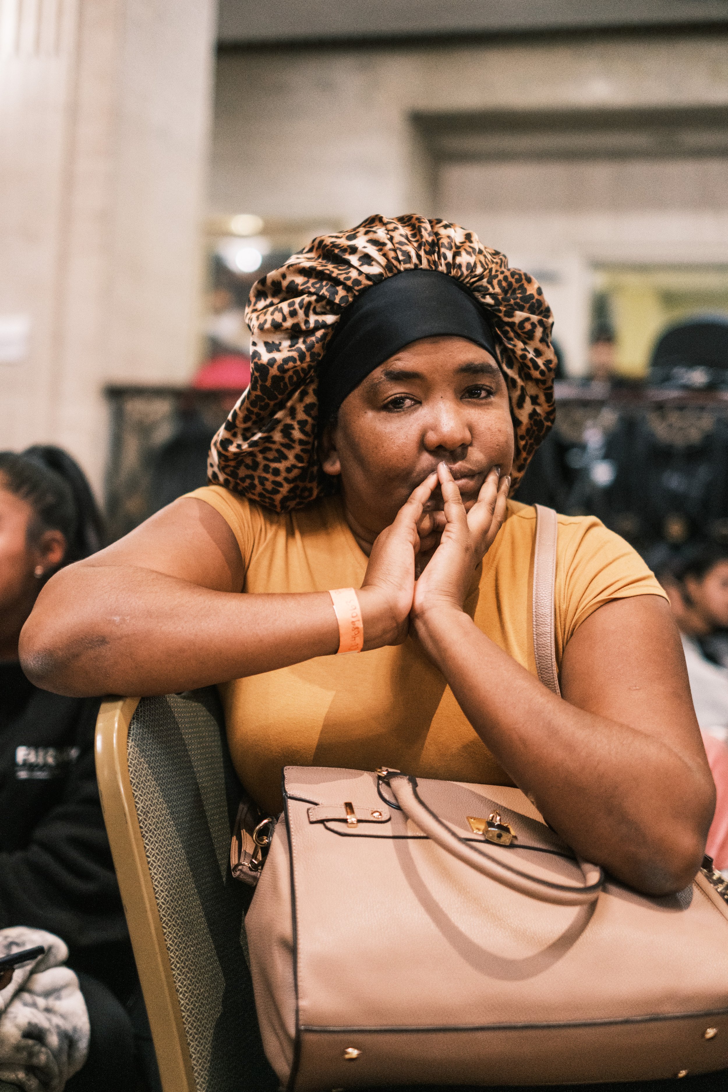  Suramy, 37, who arrived with her 3 kids from Cuba, waits to be processed at the Roosevelt Hotel in midtown, which has become the main processing center for migrants seeking asylum in New York City.  