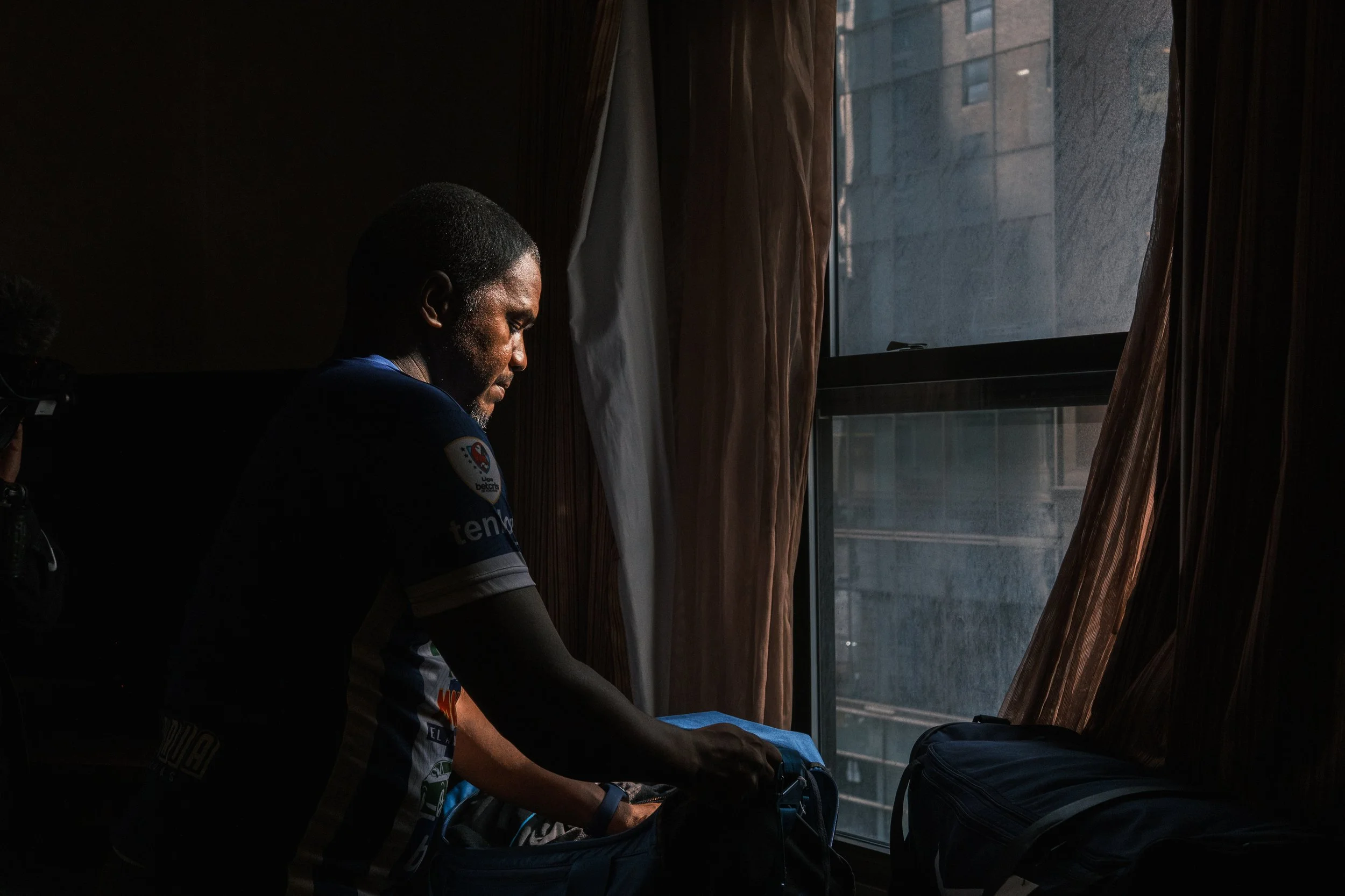 Jairo Garcia, of Honduras, packs some of his belongings. Garcia, who is in dire need of heart and kidney operations, is one of the last remaining residents of the Roosevelt.