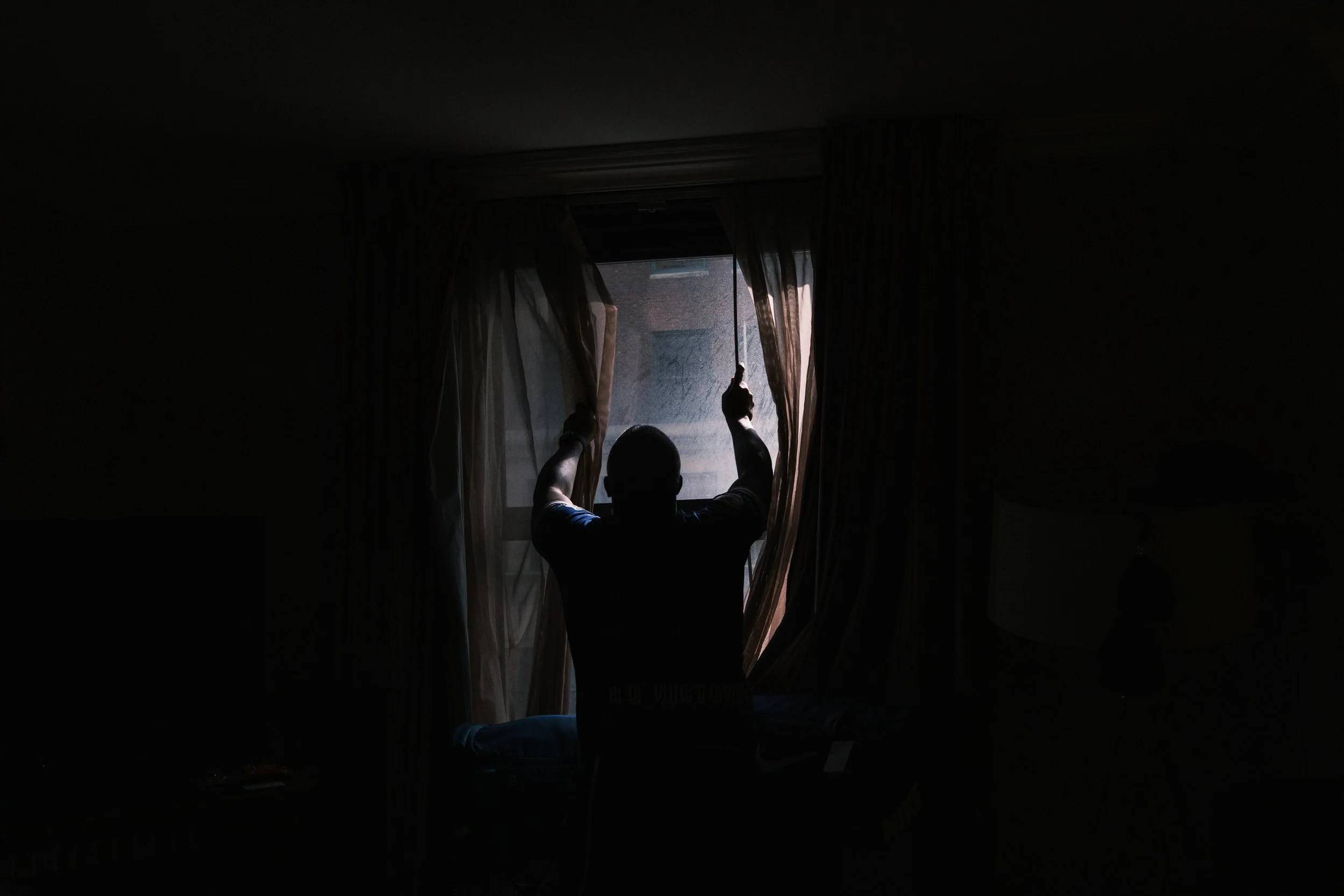 Jairo Garcia, of Honduras, packs some of his belongings. Garcia, who is in dire need of heart and kidney operations, is one of the last remaining residents of the Roosevelt.