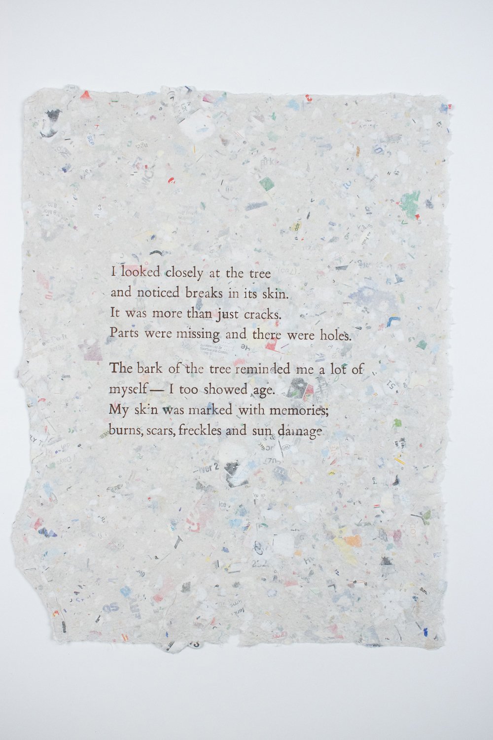poem art on handmade map paper