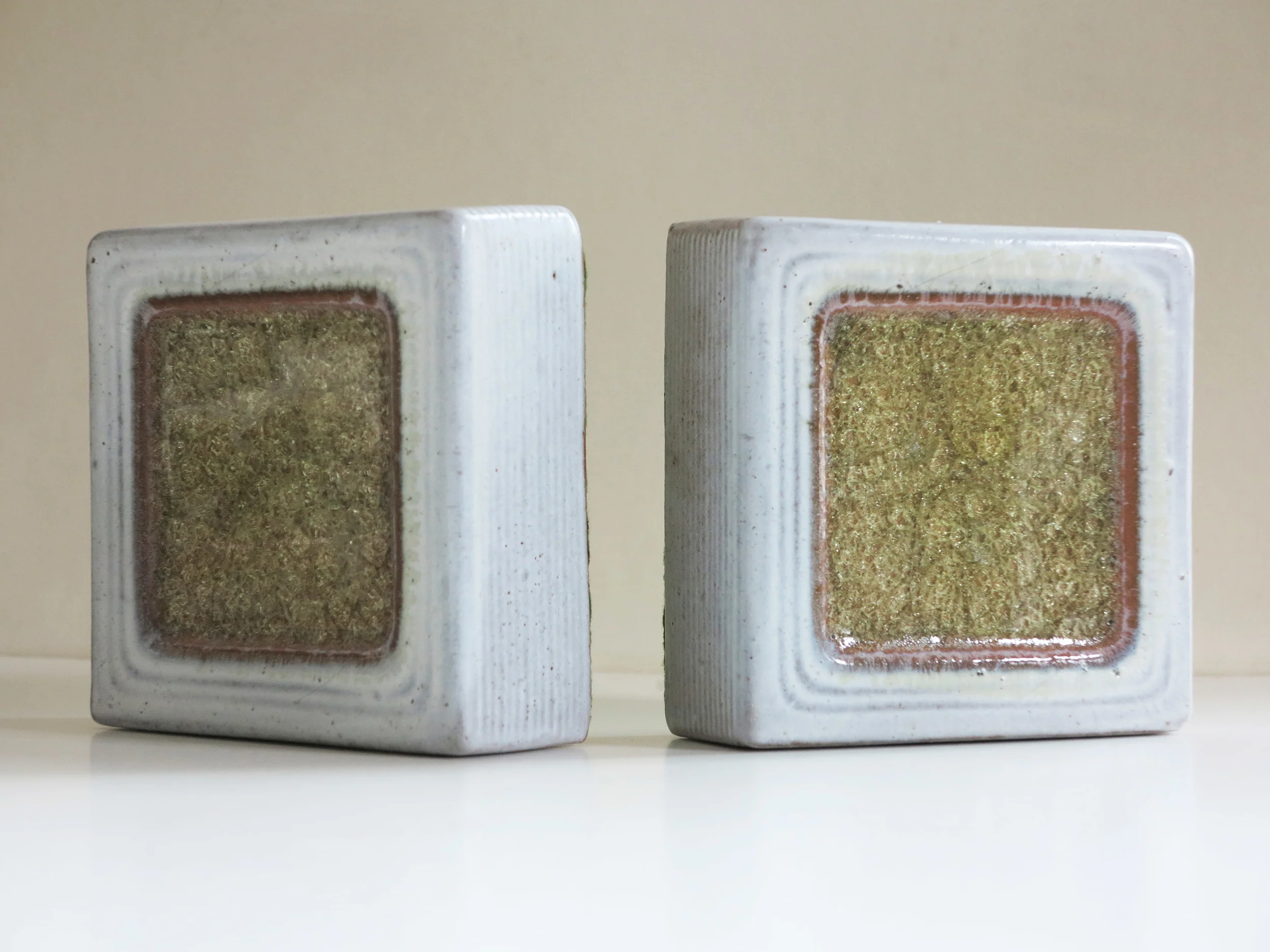 SOLD c1950 Lee Rosen for Design-Technics Ceramic Bookends. 5.5" sq.