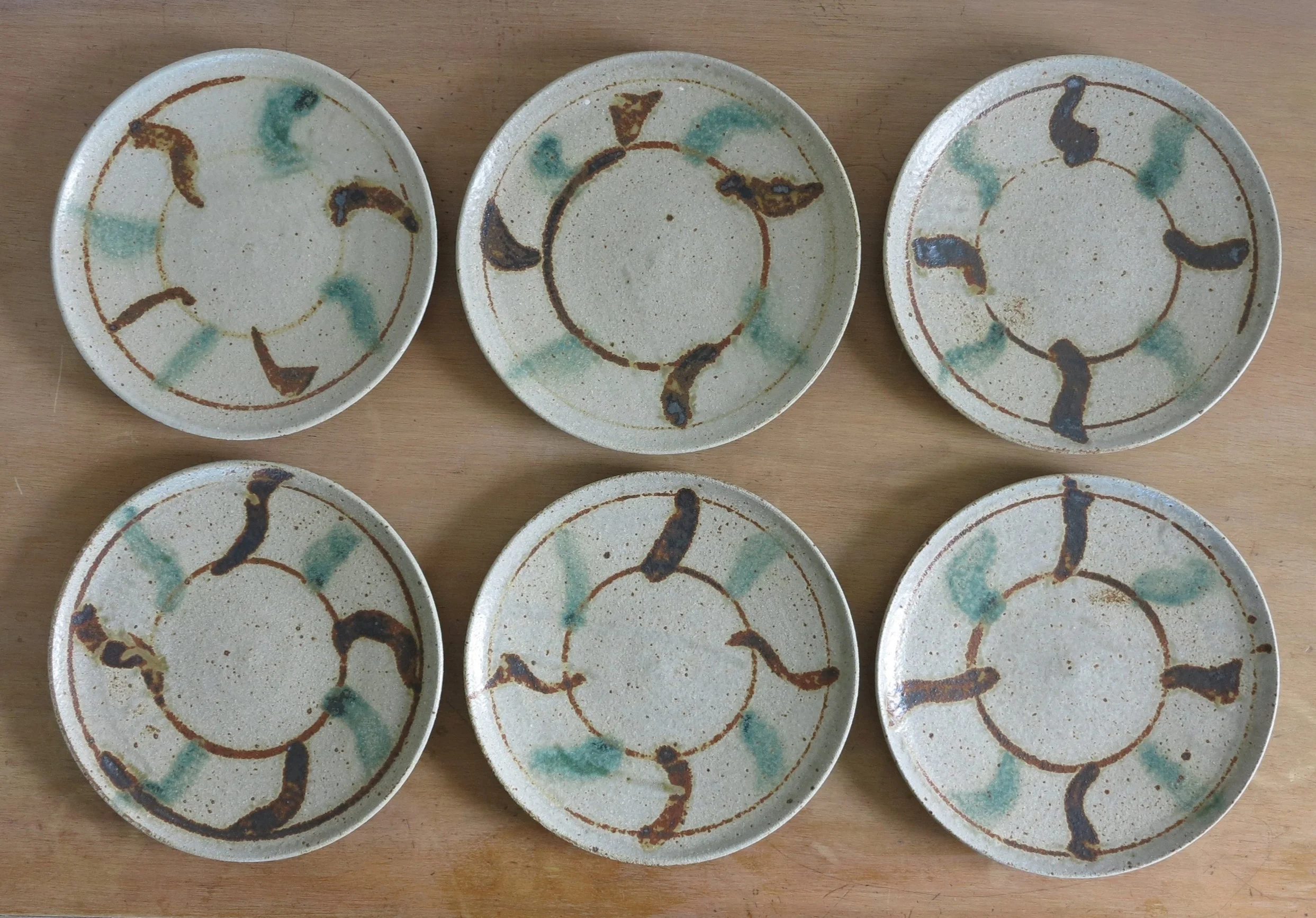 Set of 6, 1960s stoneware plates by Teruo Hara (1929-1985).  8.5" dia. 