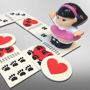 Sonia the vet helps kids play dominoes.