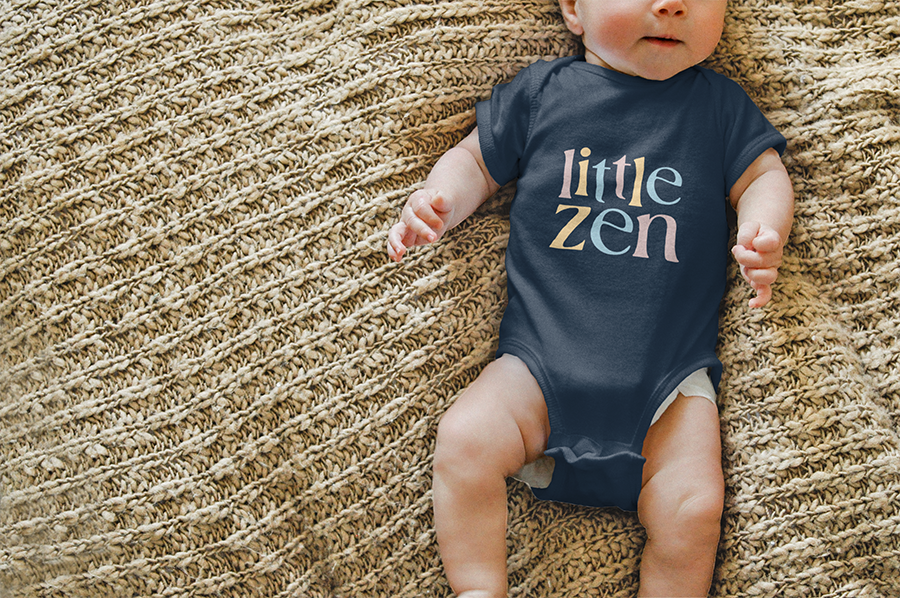 Little Zen logo on baby onesie.
