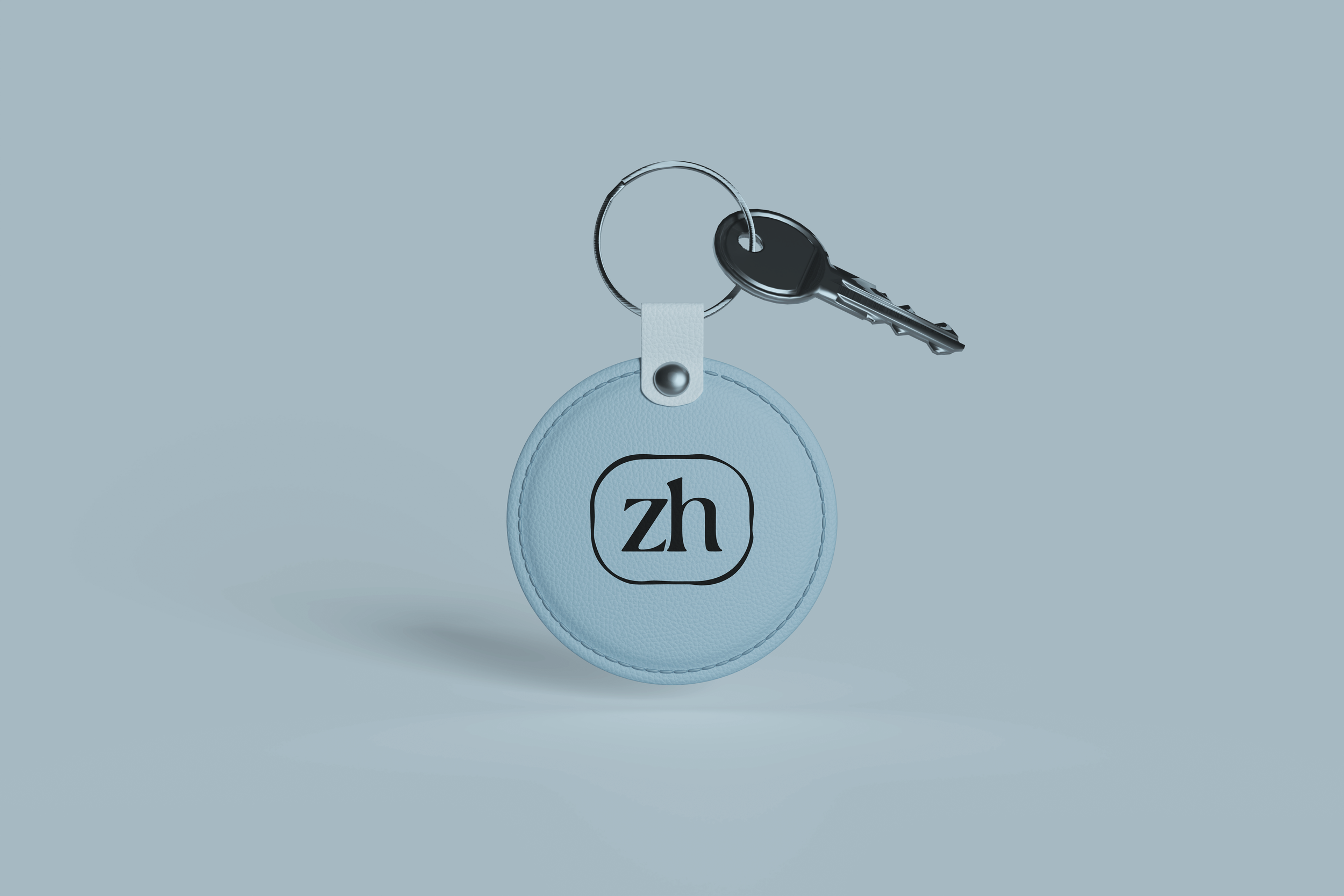 The logo icon branded on a keychain.