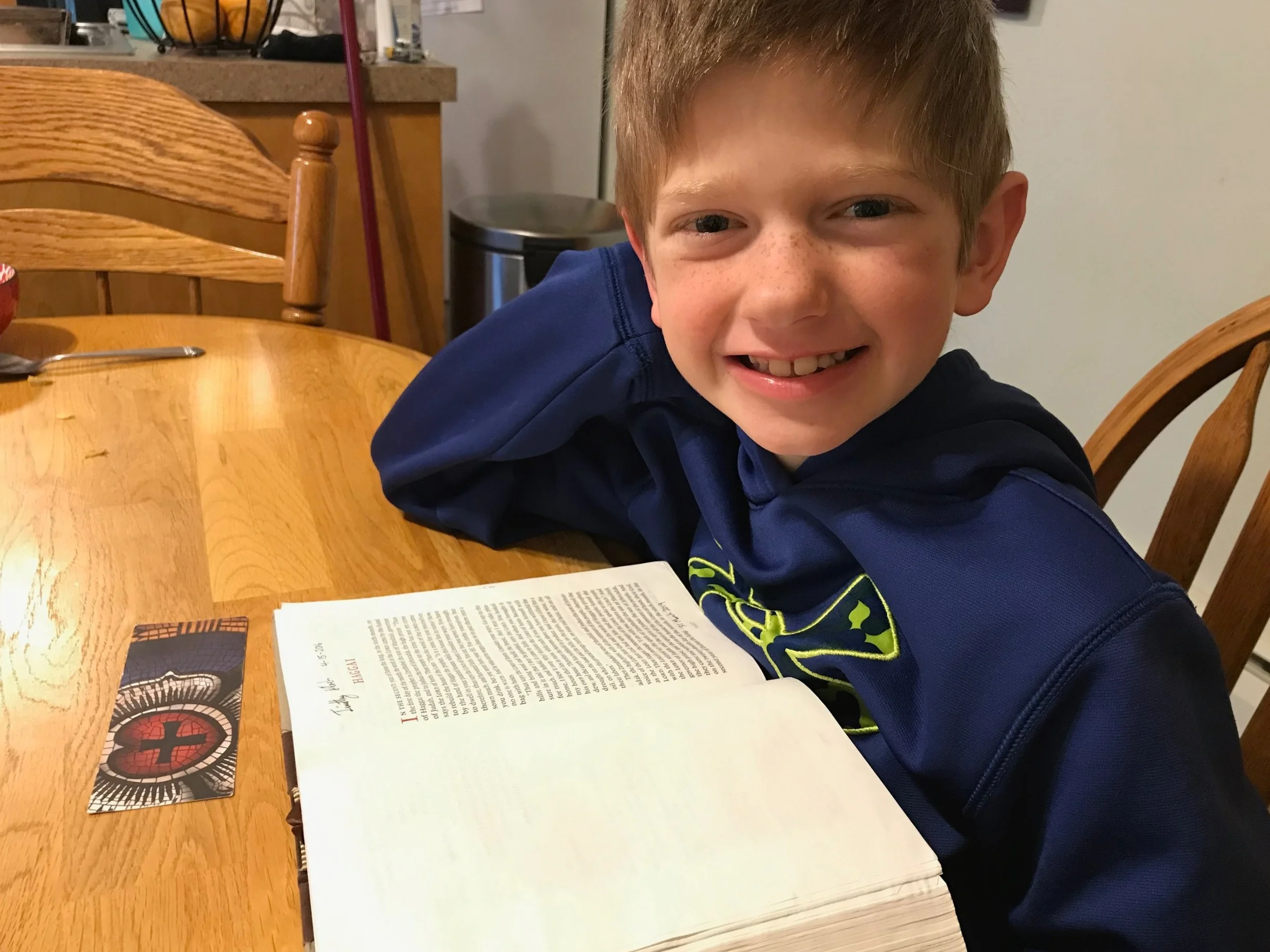 My son after he completed reading the book of Haggai on 1 April 2019.