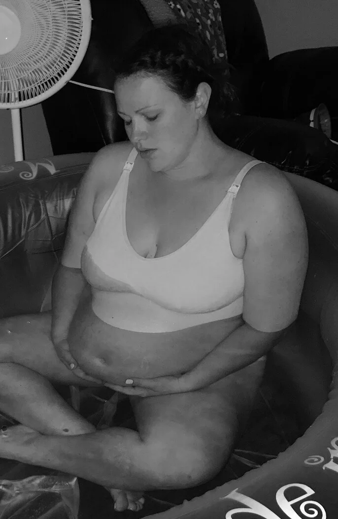 In the water, breathing through contractions.