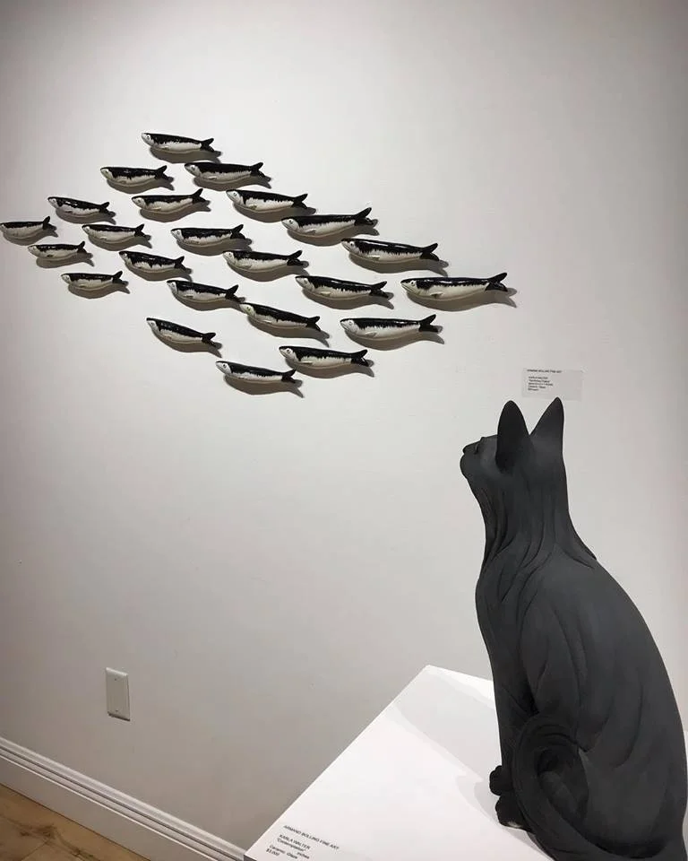 cat and sardines.jpg