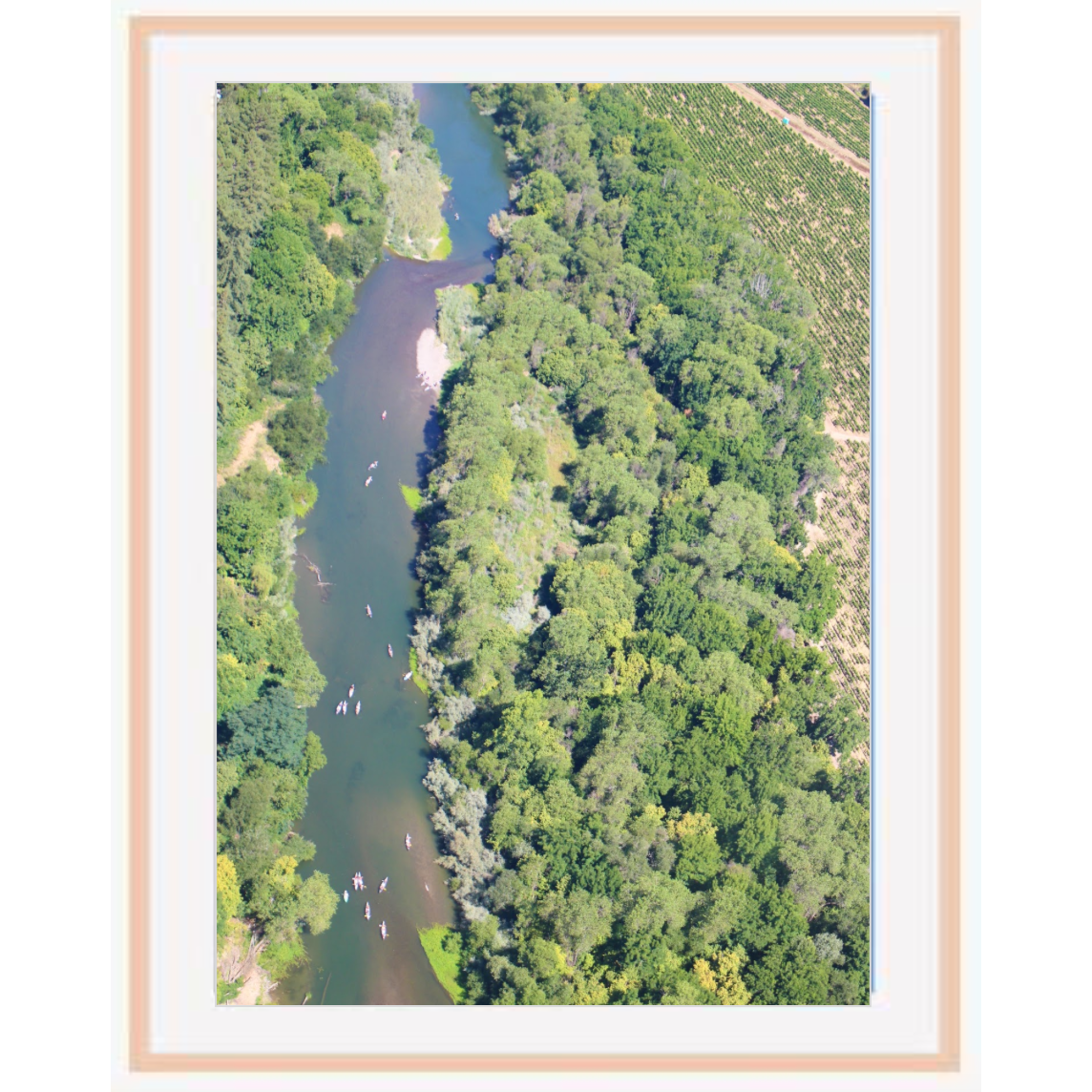 Copy of "Kayakers" photo with natural wood frame taken by Emily Roggenburk.