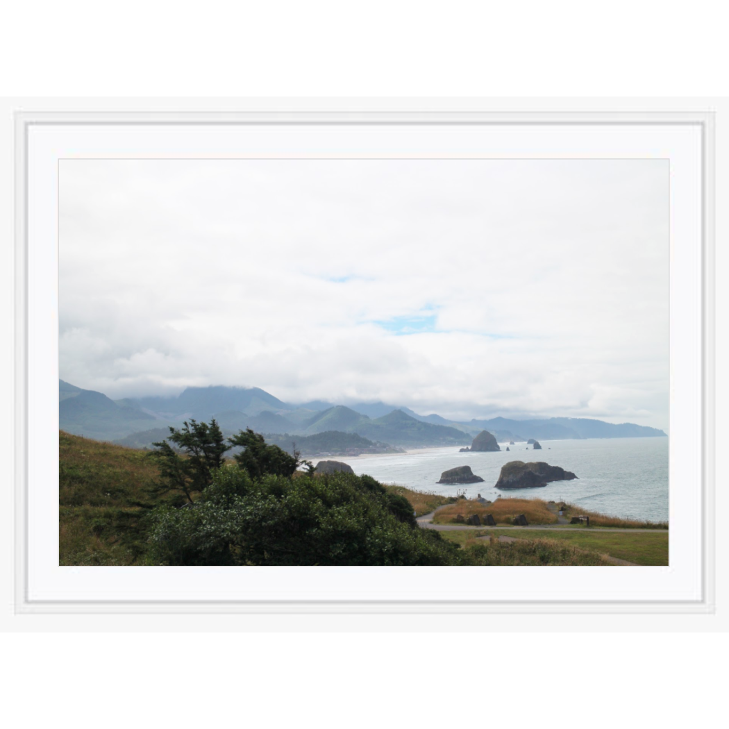 Copy of "Cannon Beach" photo with white gallery frame by Emily Roggenburk.