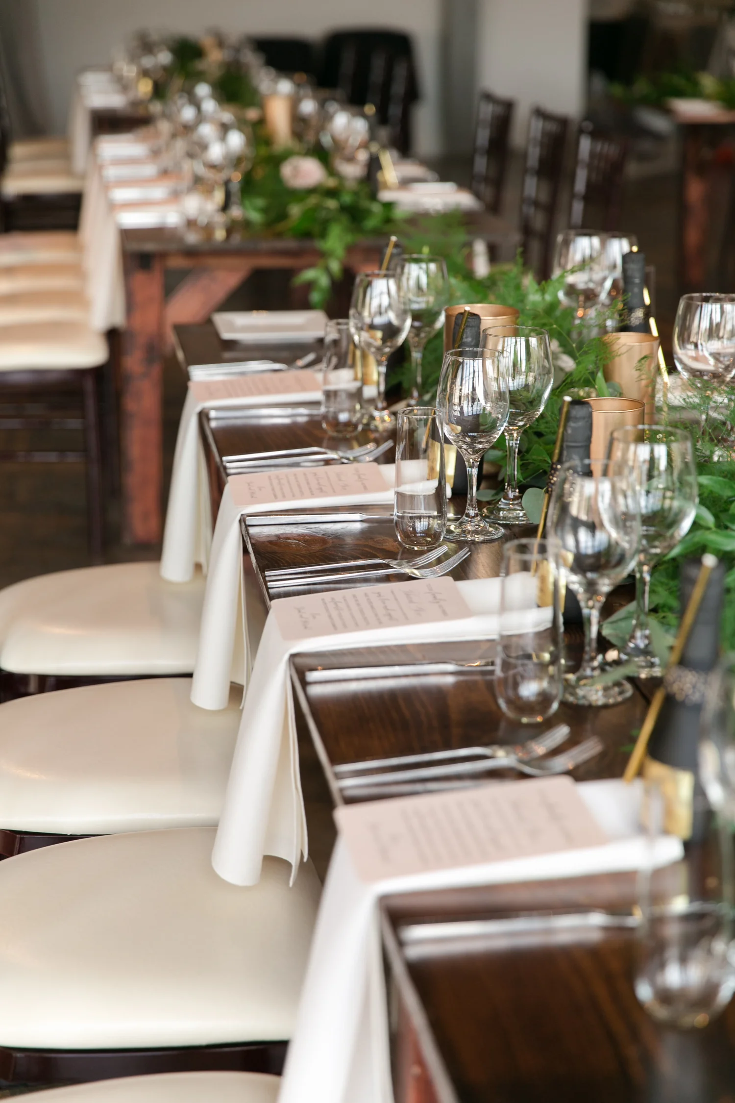 Elegant lounge seating at a rustic wedding reception