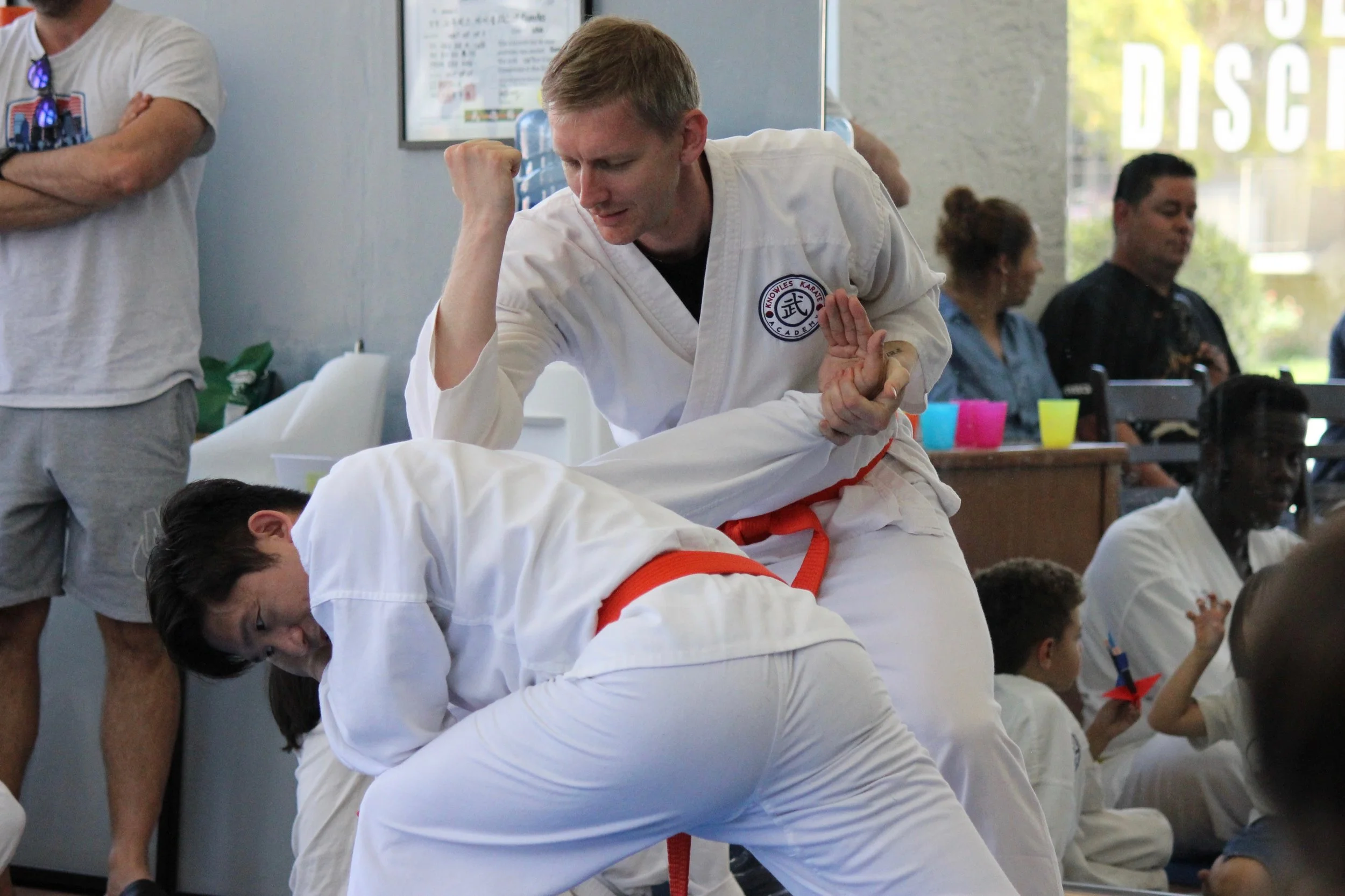 Two-on-one wrist-grab technique