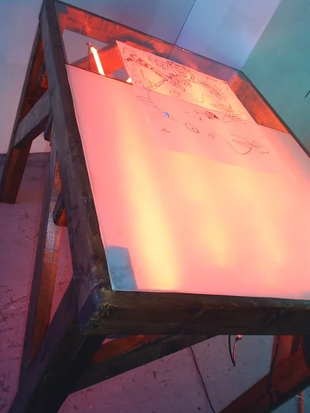 Light Table, 2005. Mixed media: wood, glass, neon, converter, electronics.
