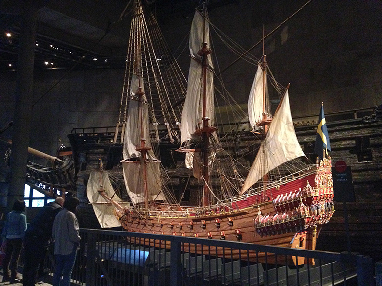 A "miniature" replica of the ship (actual ship shown behind it).