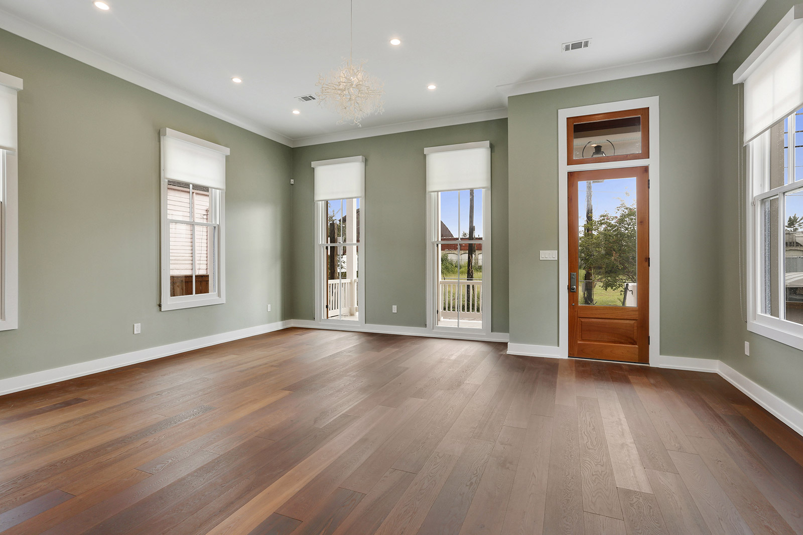 Living Room with unique light fixture and view of the Corten Steel Rainbow Bridge