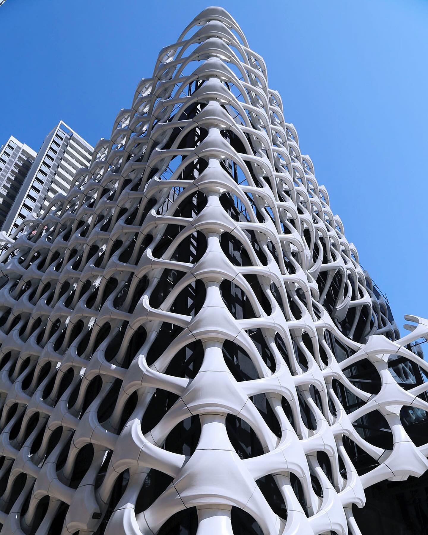// Arachne - 3D Printed Facade 

Arachne is an innovative digital architectural project, designed by ASW, that transforms an ordinary three-story building, measuring 10 meters in height and 12 meters in width, through the use of 3D printed components