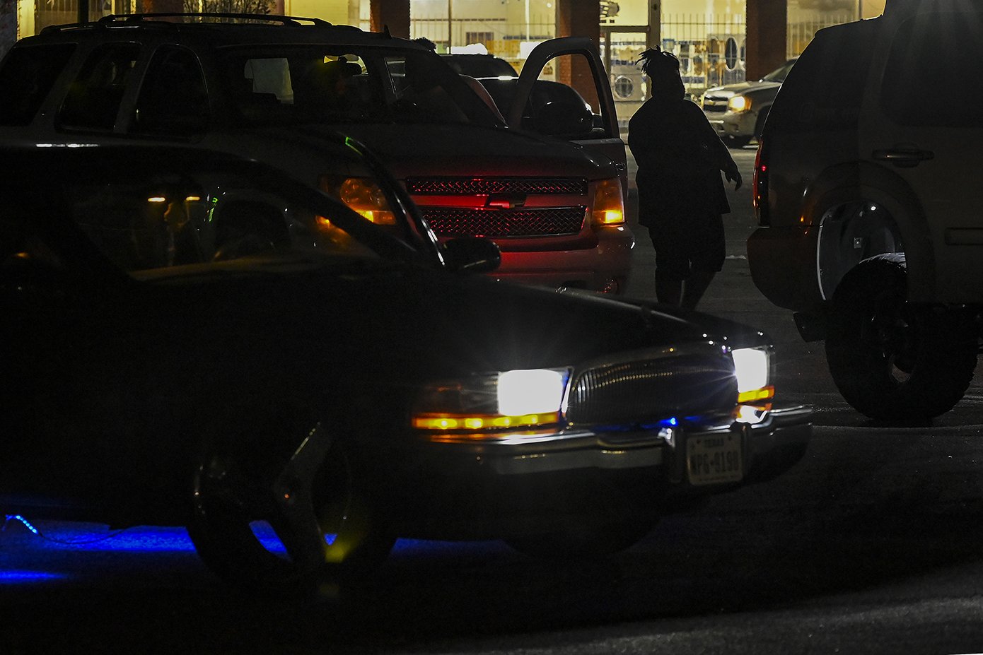  Members of The Roadrunnas car club meet in an empty parking lot off Buena Vista Rd. in Columbus, Ga., Oct. 8, 2021.The club was started by Dontrell Grier and Giovanni Fleur in remembrance of Cedric Jamal Mifflin, a young unarmed black man who was sh