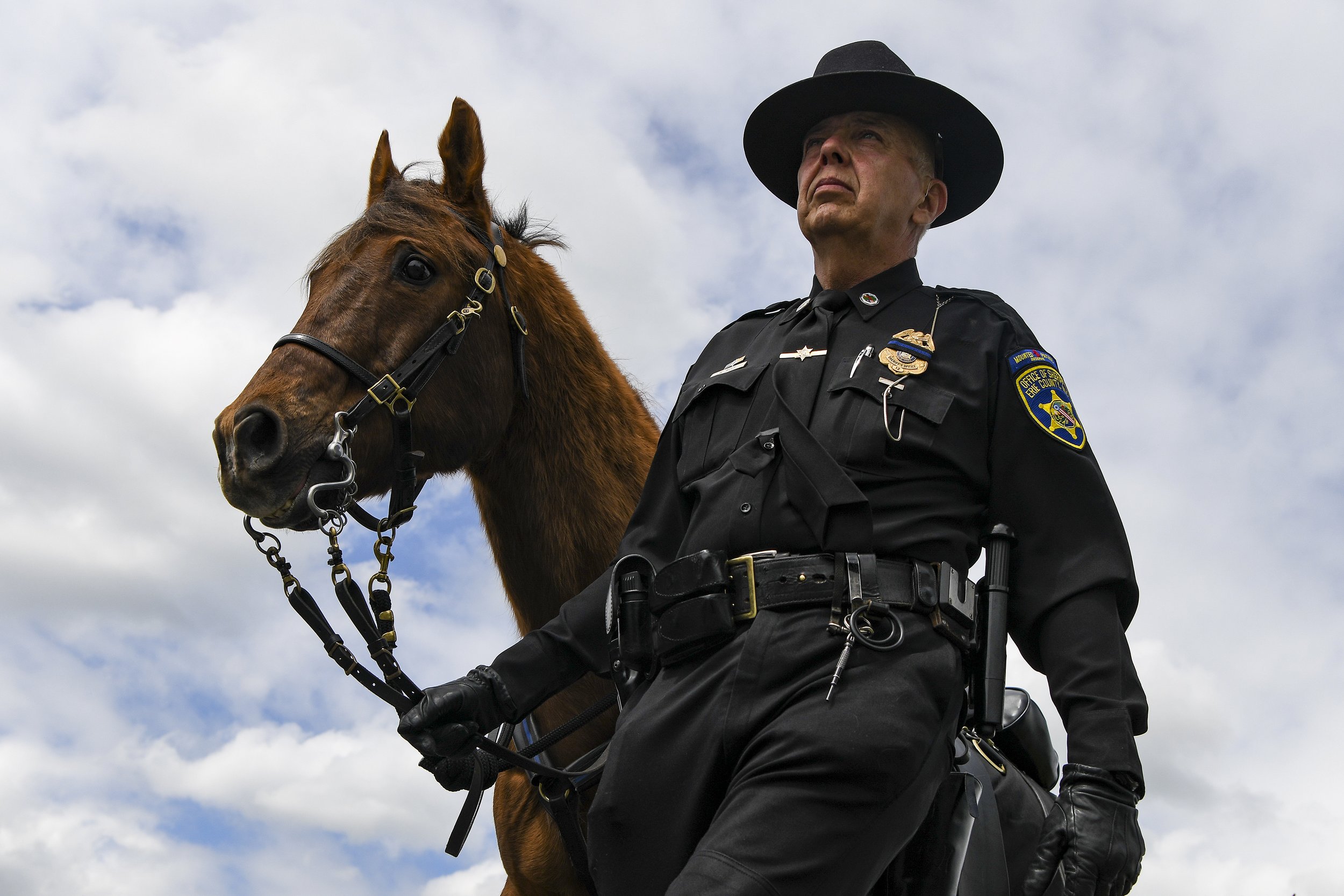  A Mounted Police officer attends a funeral service for former police officer Aaron Salter who was killed while on duty as a security guard at Tops when fired at the gunman in an effort to stop him. 