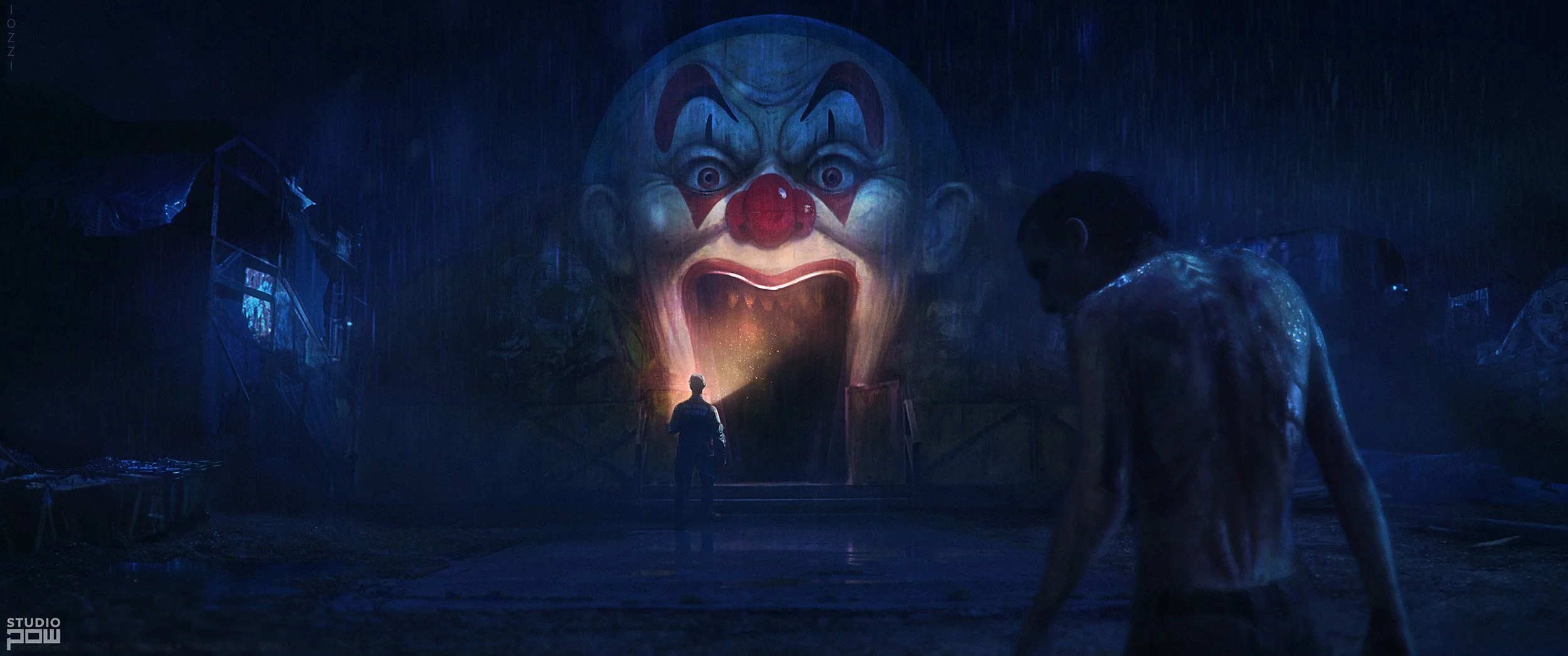 A person with a flashlight facing a giant, frightening clown face with an open mouth in the background, during rainy night.