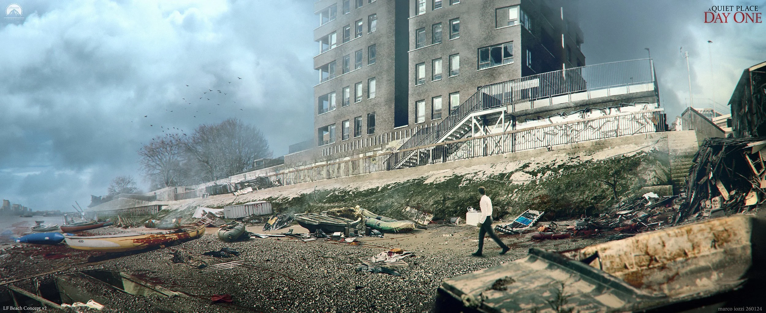 A scene of destruction by a beach with overturned boats, debris, and damaged buildings. A person in a white shirt walks along the debris-strewn shoreline under a cloudy sky.
