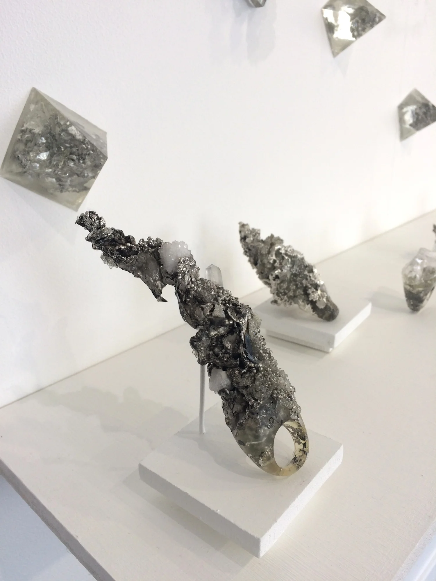 Chloe Lewis - Impacts of Climate Change (Pewter, resin, glass, sterling silver, electro-formed silver and natural materials)