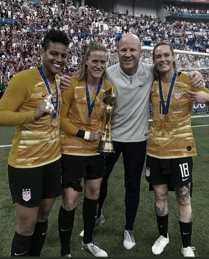 USWNT Goalkeepers, AD Franch, Ashlyn Harris, Alyssa Naeher and USWNT Goalkeeper Coach, Graeme Abel celebrate the 2019 FIFA World Cup victory.