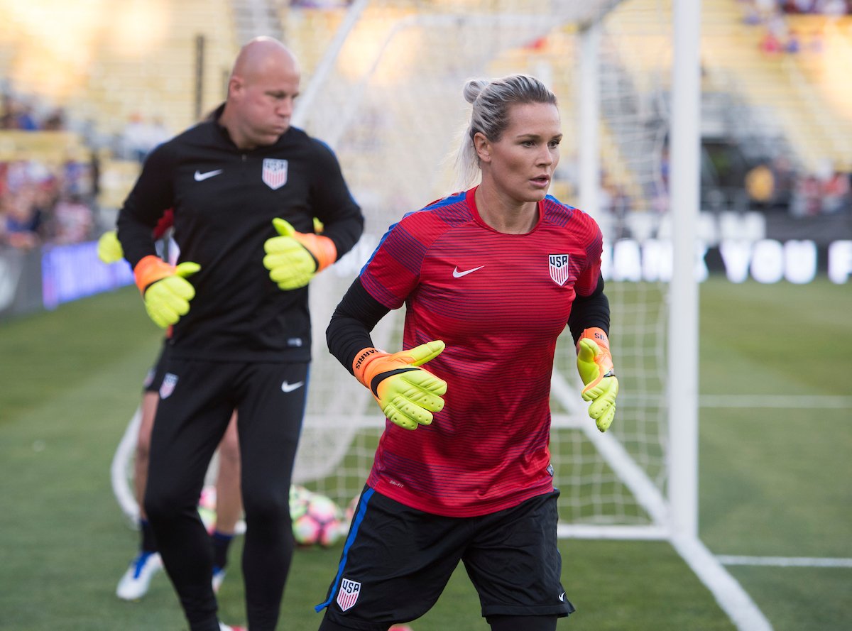 Graeme Abel and US Women's National Team goalkeeper, Ashlyn Harris warm up prior to a game.