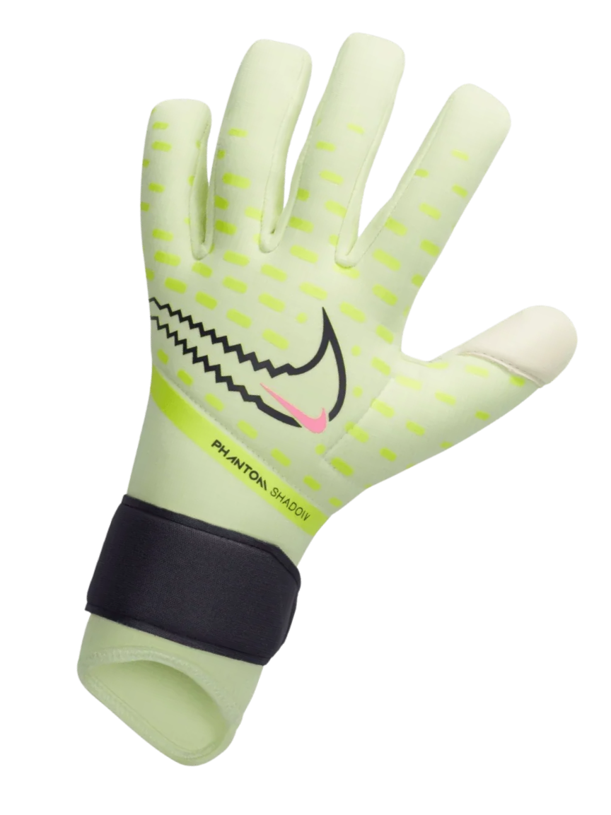 A Nike Phantom Shadow goalkeeper glove with a black wrist strap and yellow dotted grip surface, featuring a large Nike swoosh logo and abstract black design.