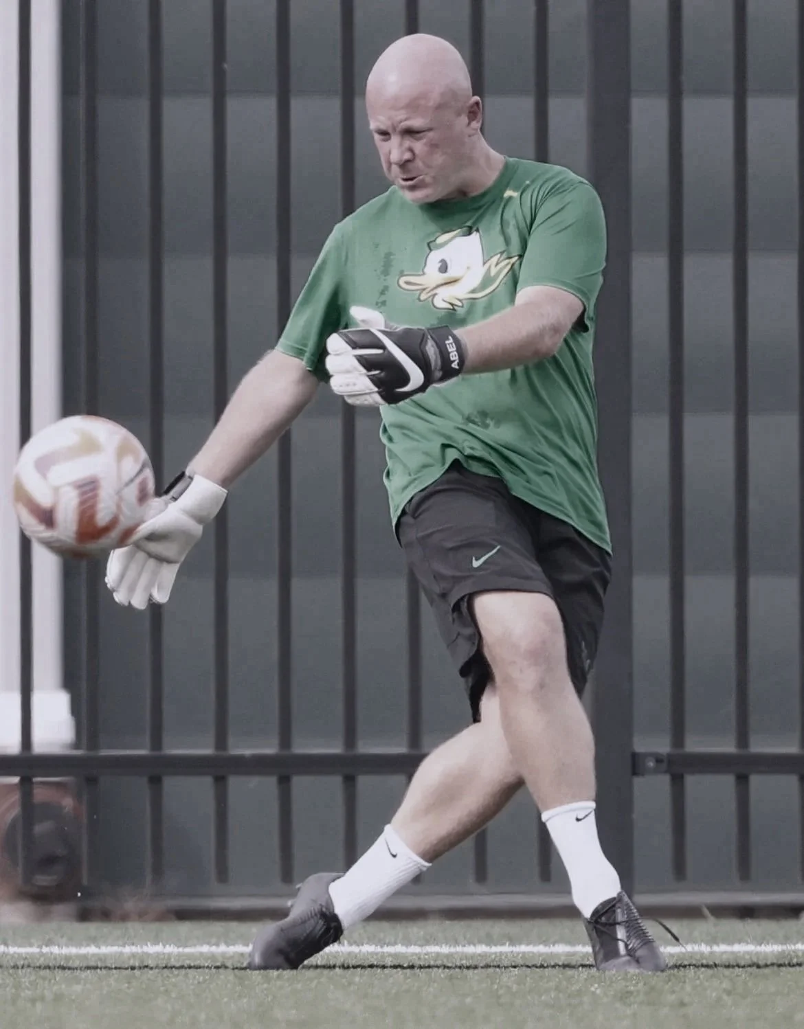 Graeme Abel striking the ball in warm up for the University of Oregon.