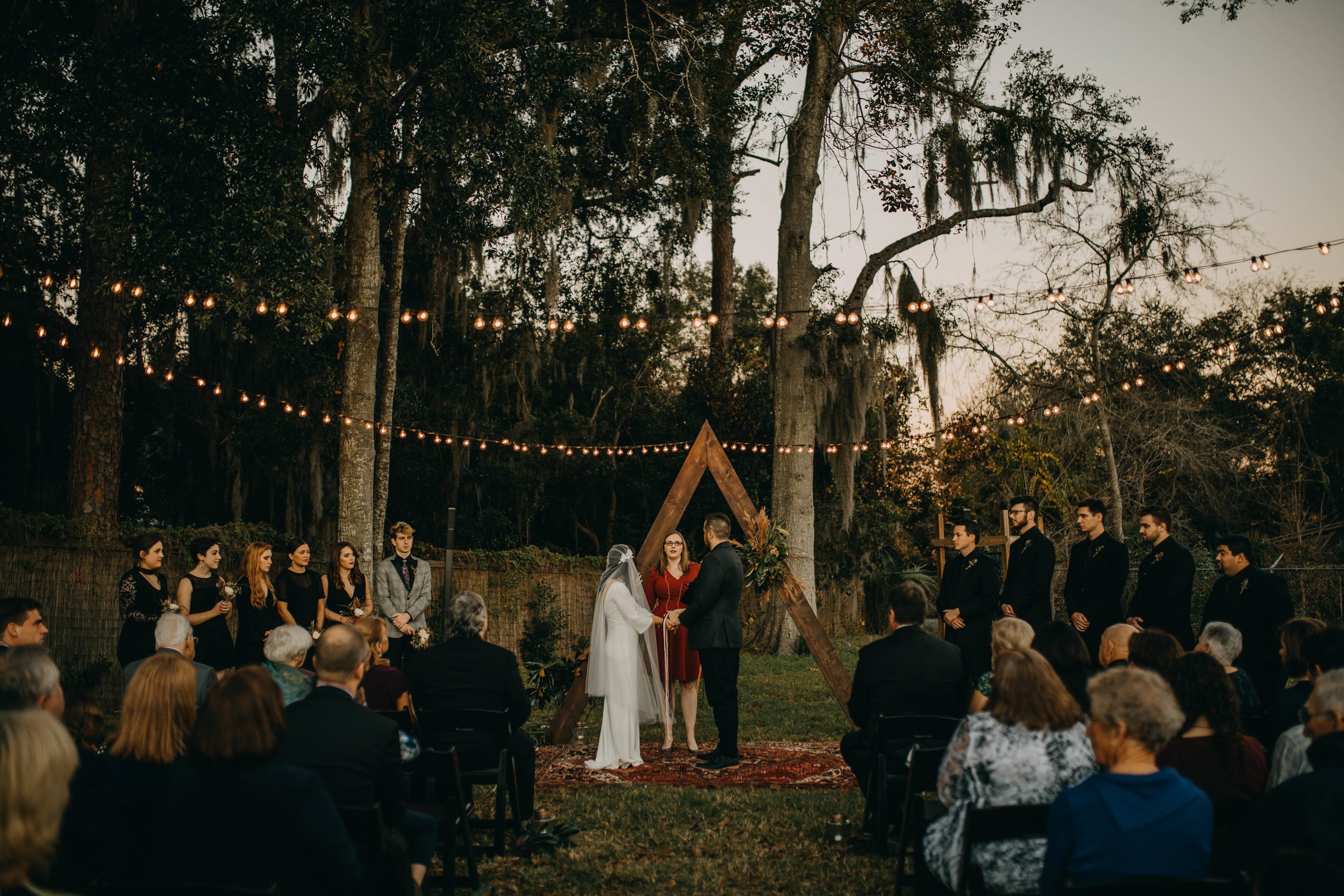 Boho Outdoor Ceremony with String Lights | American Traditional Tattoo Themed Eco Friendly Dark Florida Wedding