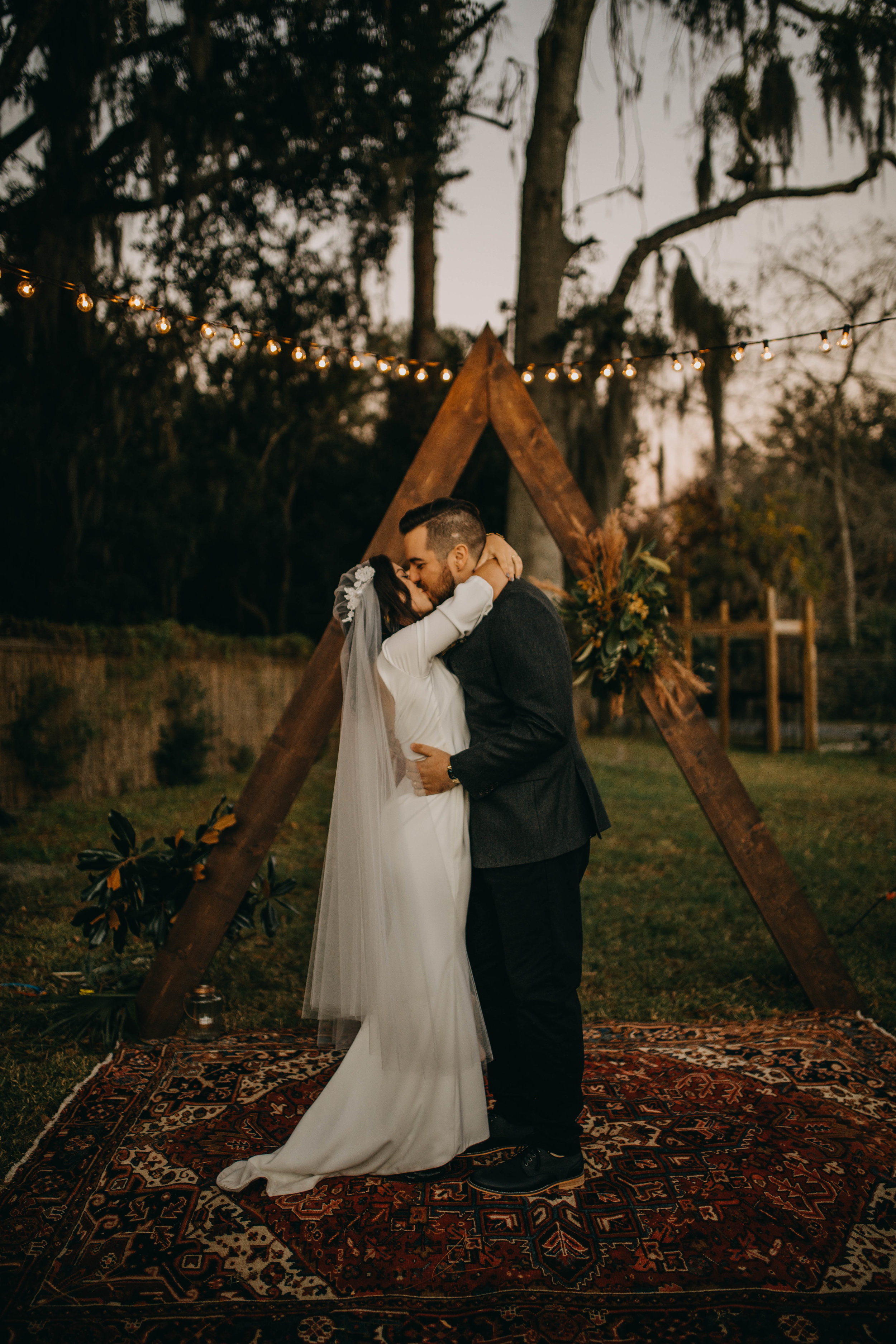 First Kiss Picture | American Traditional Tattoo Themed Eco Friendly Dark Florida Wedding