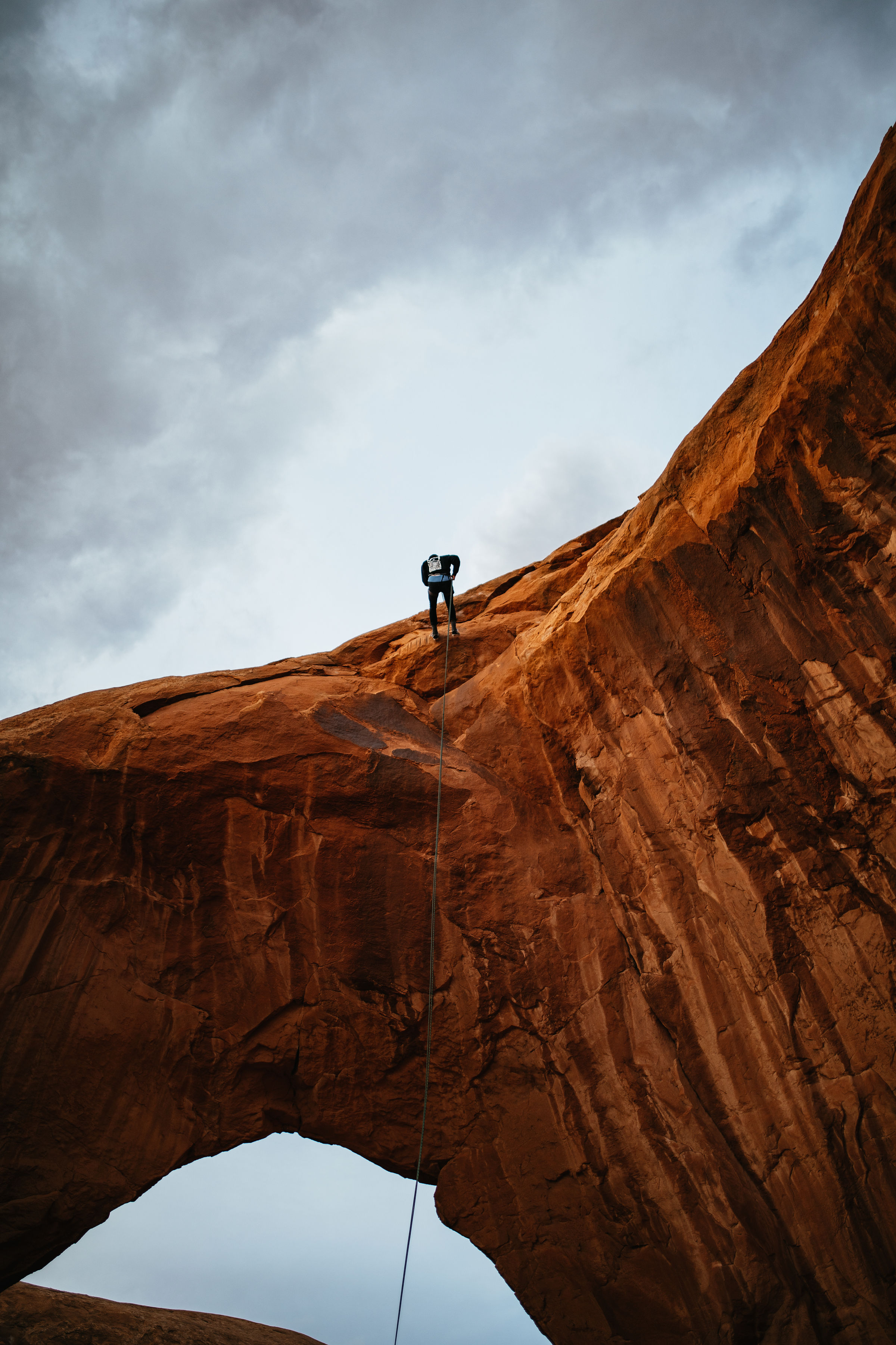 Rock Repelling adventure photography in Moab, Utah
