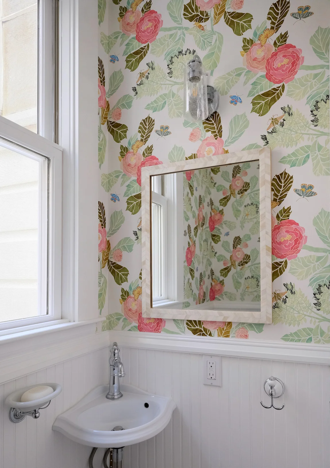 white powder room with floral wallpaper.jpg