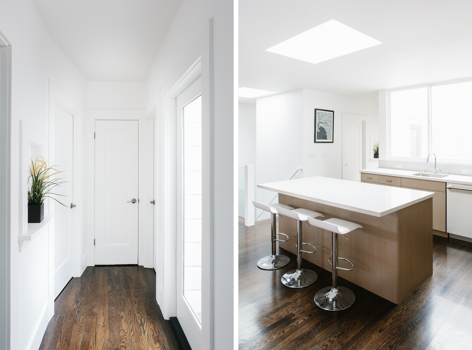 hallway with white walls and wood flooirng and kitchen with light wood cabinets and white counters and bar seating and wood flooring.jpg
