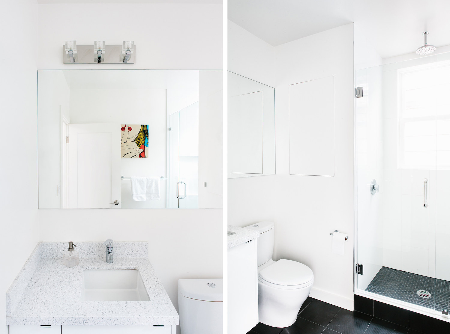 white bathroom with black tile floor and corner vanity with granite counter and chrome fixtures.jpg