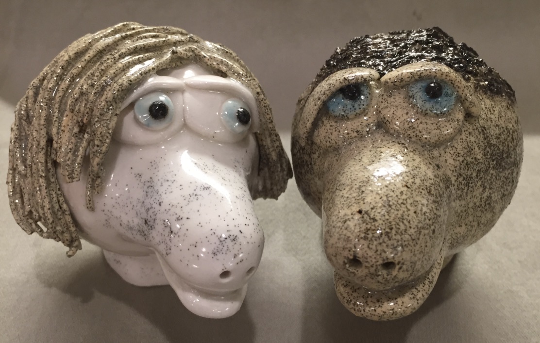 Porcelaine, mid fire freckle clay bodies. Watered down neon blue eyes. Something about the earth tones in my palette these days. Something about figuring out where color can work. Mid fire allows for strength, clarity and brightness. Mid fire allows for the most integration. 