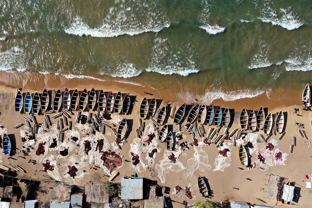 Aerial view of fishing boats on the shore of Lake Malawi at the Senga village. (Photo: Gianluigi Guercia, Associated Foreign Press.)