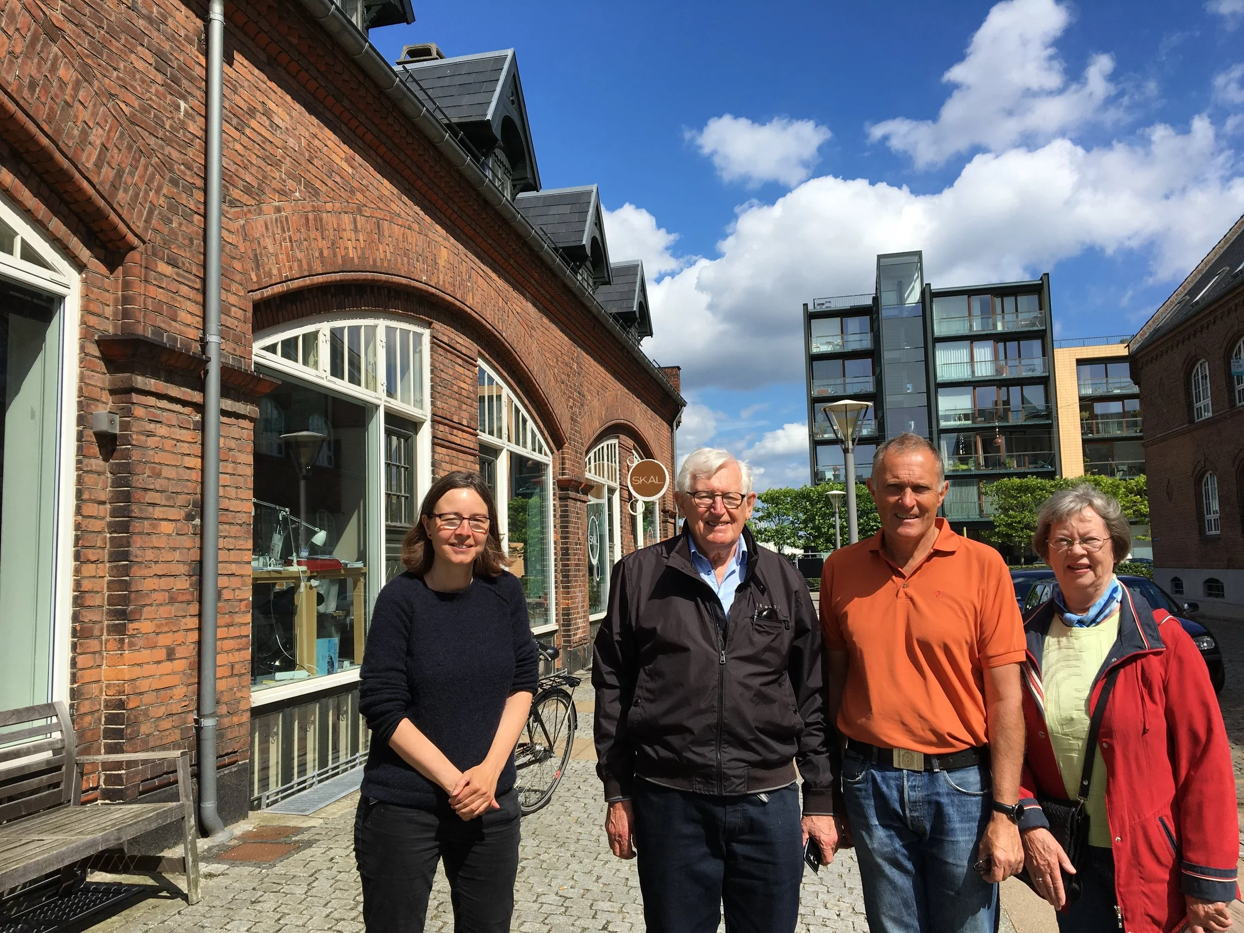 From Left: producer Signe Byrge Sørensen welcomes Jørgen Aage Holm, his son and family to the Copenhagen office.