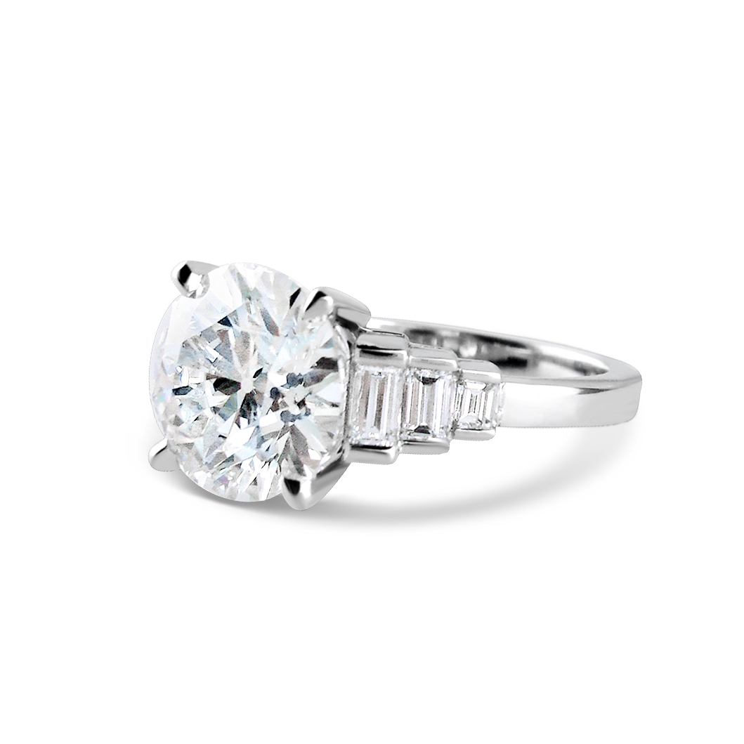 Brilliant-cut-diamond-and-baguette-cut-diamond-ring-1.jpg
