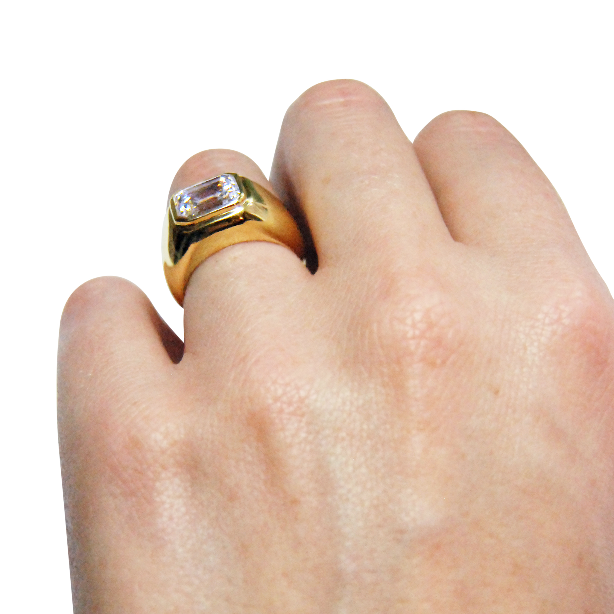 Emerald-cut-diamond-and-18ct-yellow-gold-ring.jpg