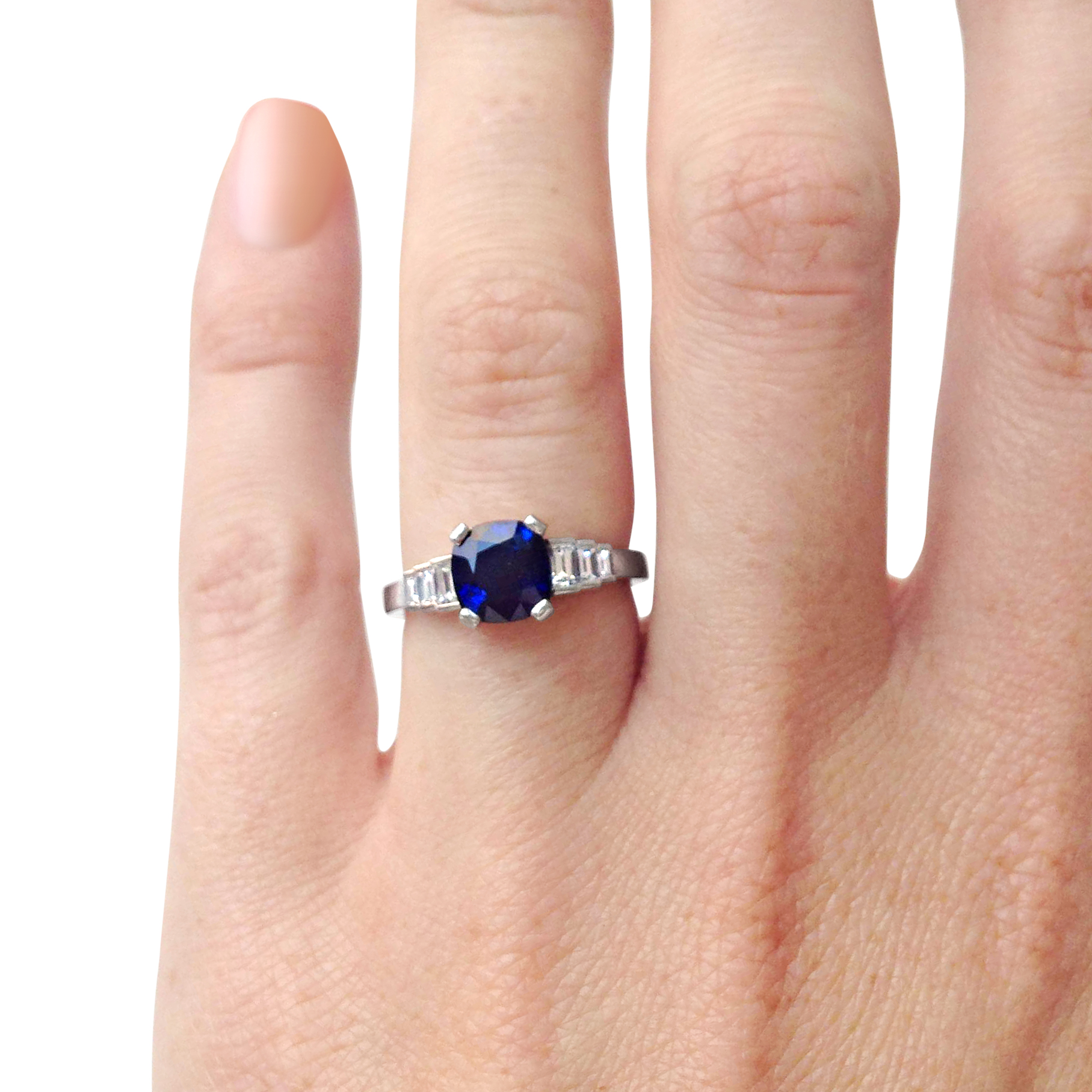 cushion-shaped-Sapphire-and-diamond-baguette-cut-ring-mounted-in-platinum-1.jpg