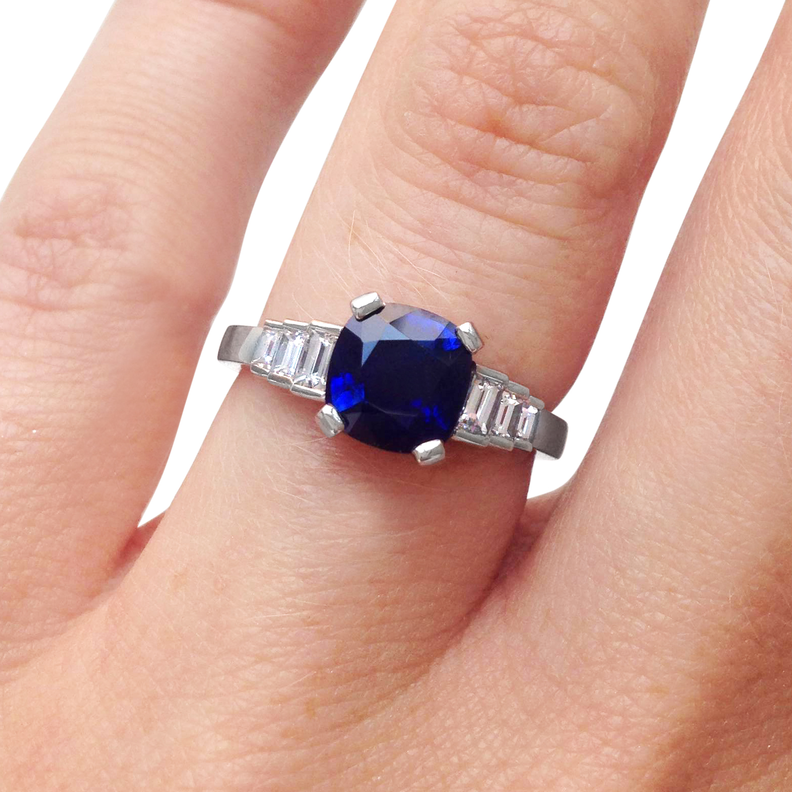 cushion-shpaed-sapphire-and-diamond-baguette-cut-ring-mounted-in-platinum.jpg