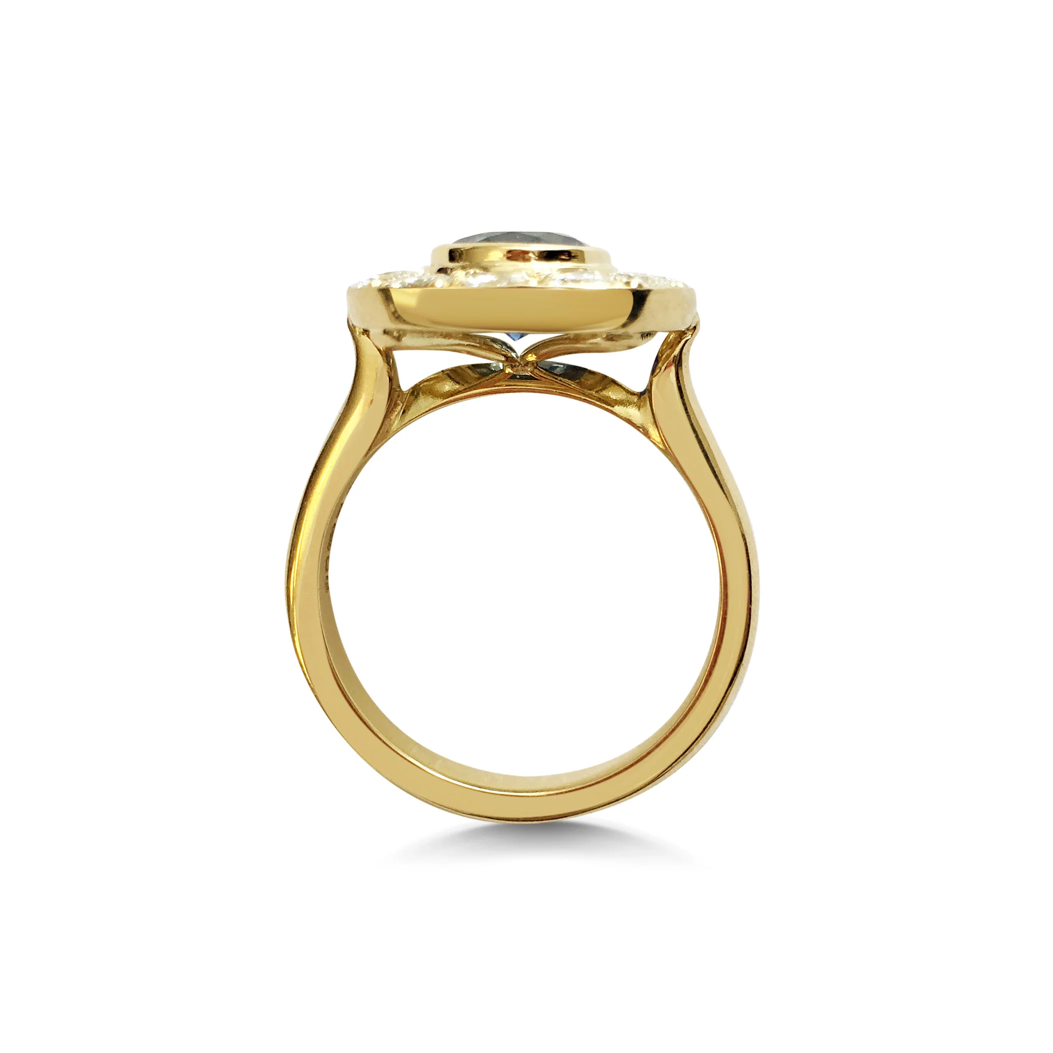 Sapphire-and-diamond-cluster-engagement-ring-in-yellow-gold-1.jpg