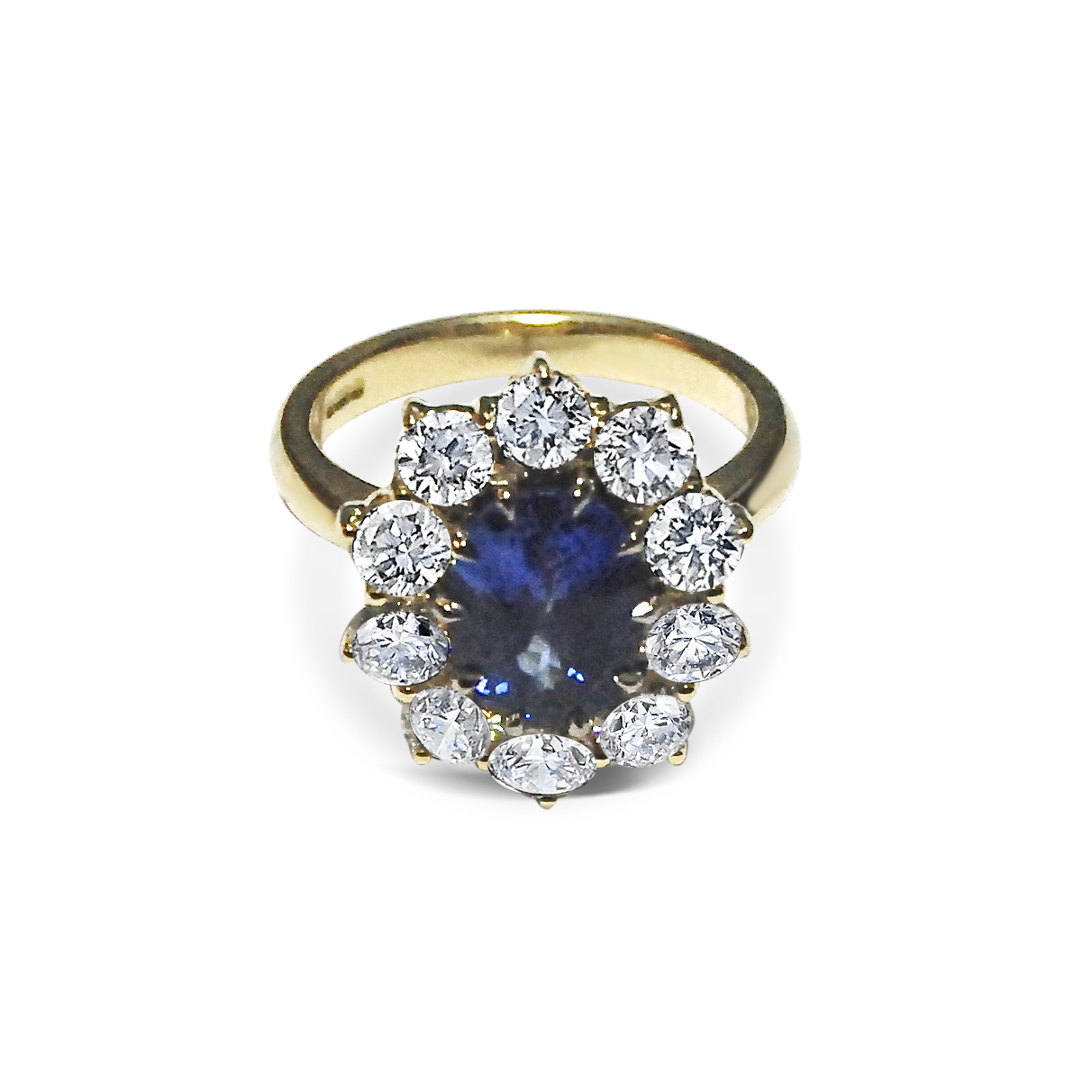 Sapphire-and-diamond-cluster-ring-mounted-in-yellow-gold.jpg