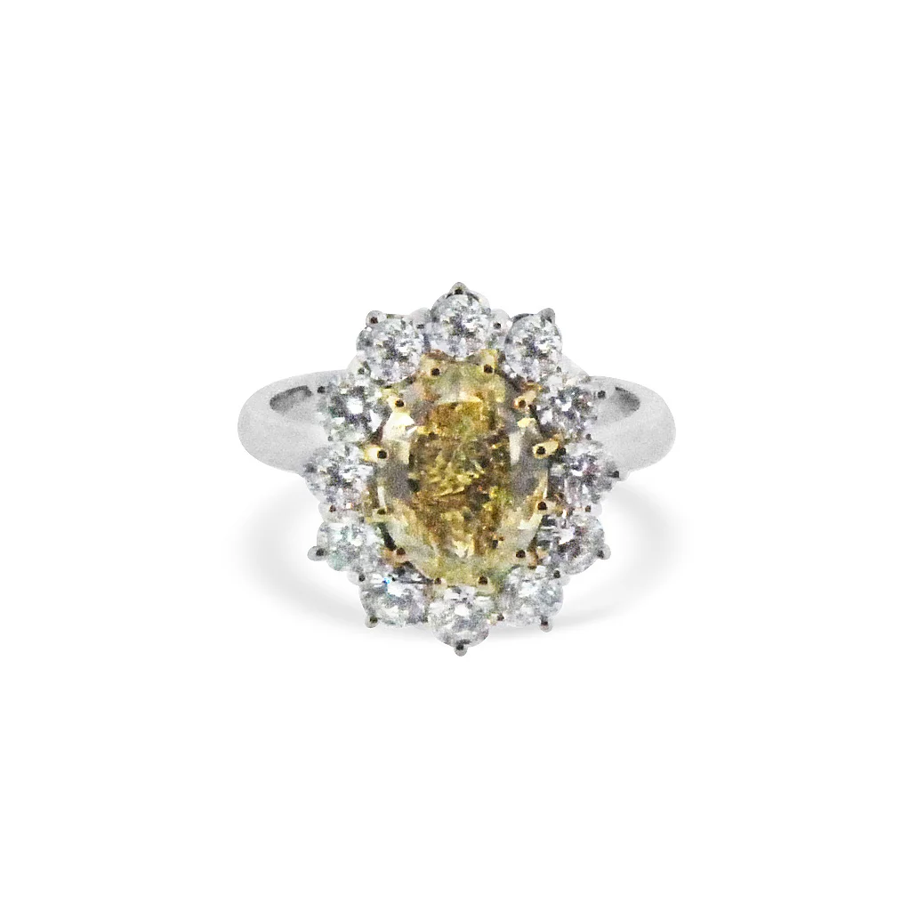 Yellow-diamond-oval-cluster-ring-in-platinum-2.jpg