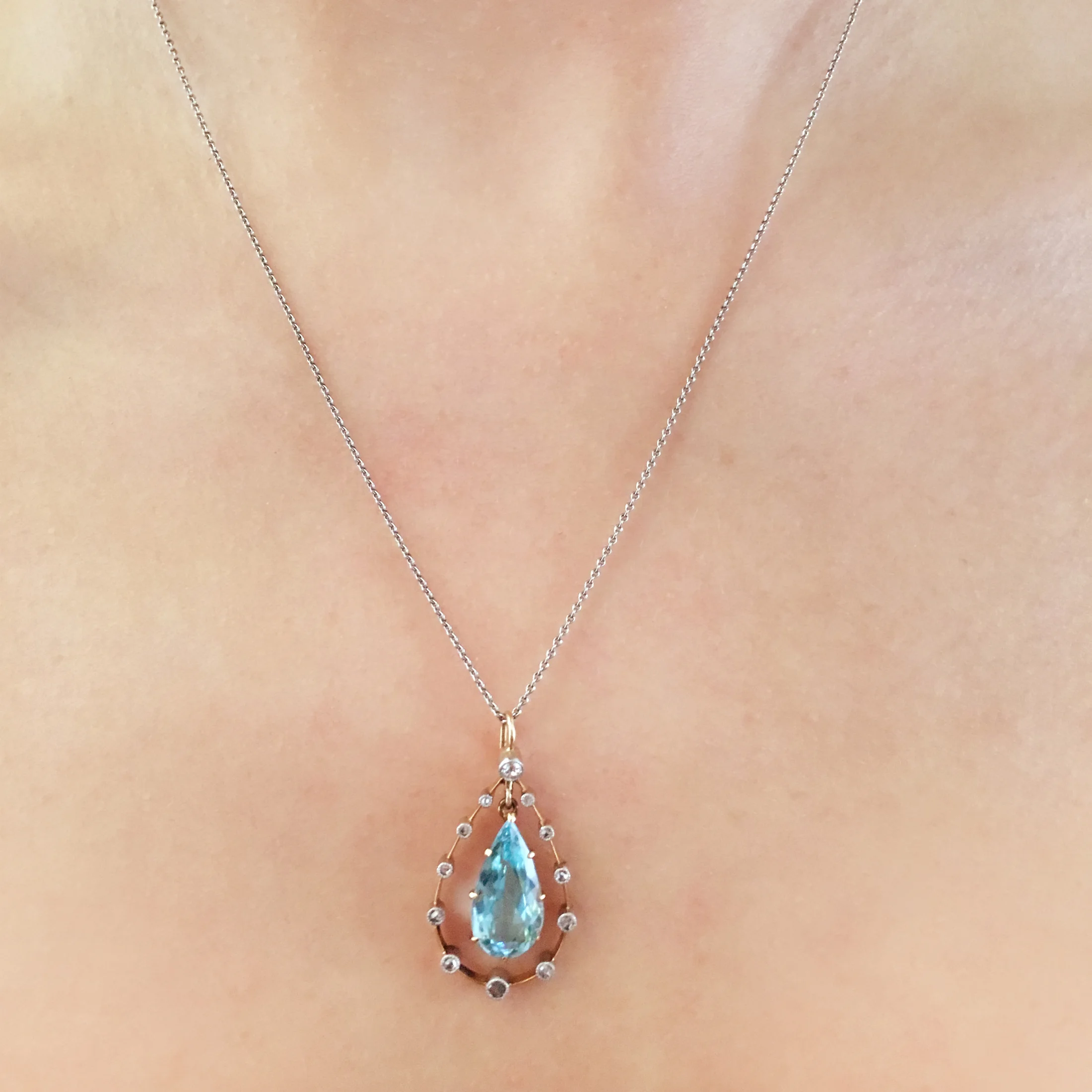 Antique pear-shape aquamarine and diamond pendant model shot