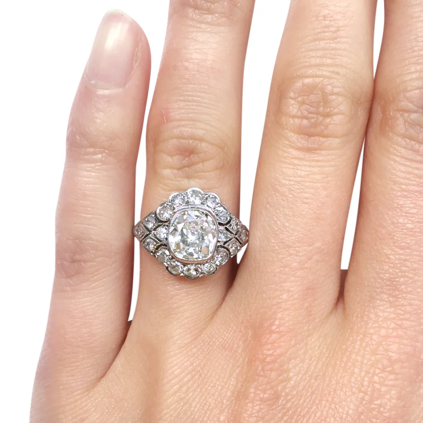 cushion-cut diamond ring hand shot